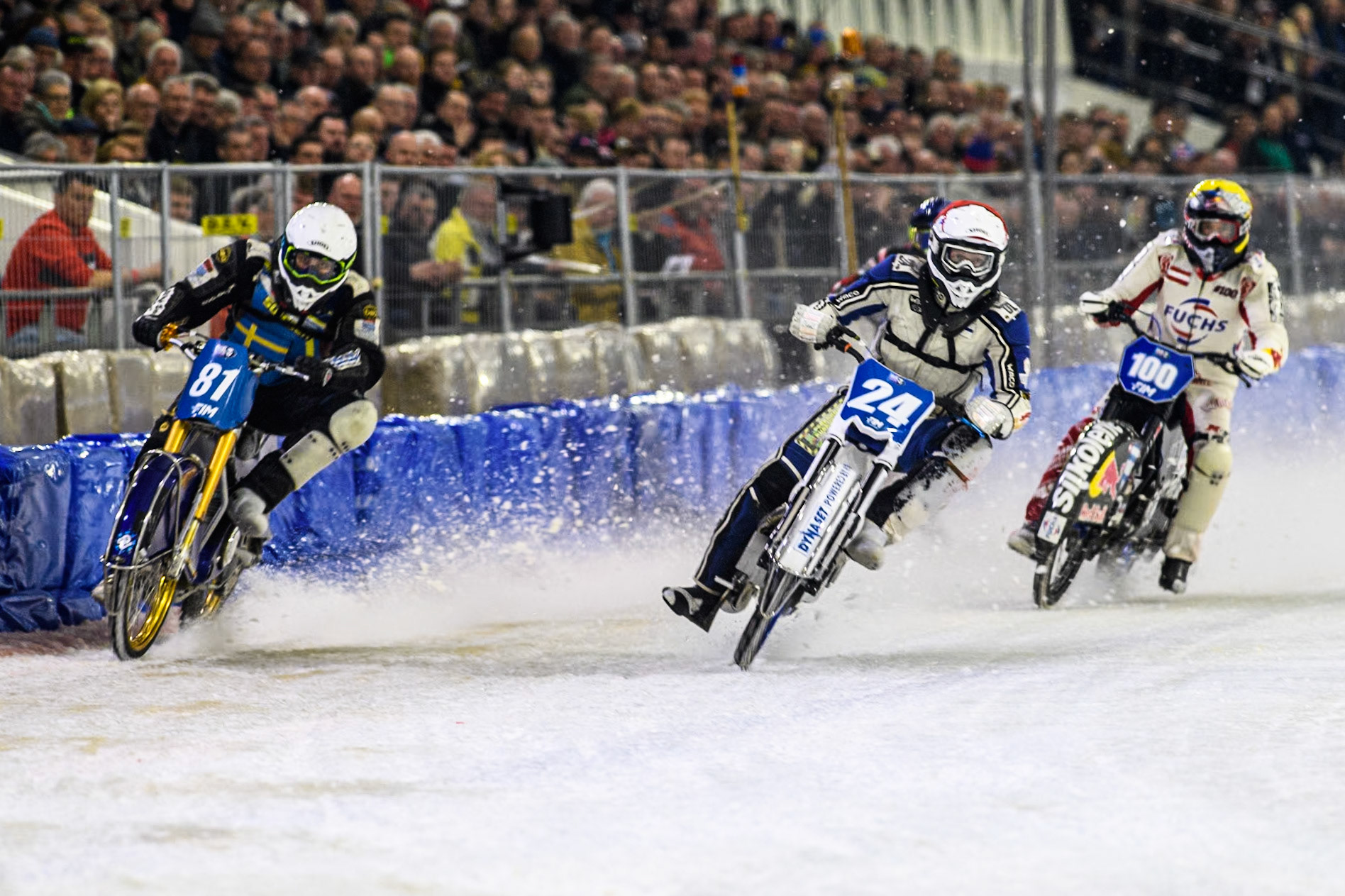 Finland's Max Koivula (24) in Red rides inside Sweden"s Jimmy Olsén (81) in White with Austria's Franz Zorn (100) in Yellow behind during the FIM Ice Speedway Gladiators World Championship Final 3 at Ice Rink Thialf, Heerenveen on Saturday 6th April 2024. (Photo: Ian Charles | MI News)