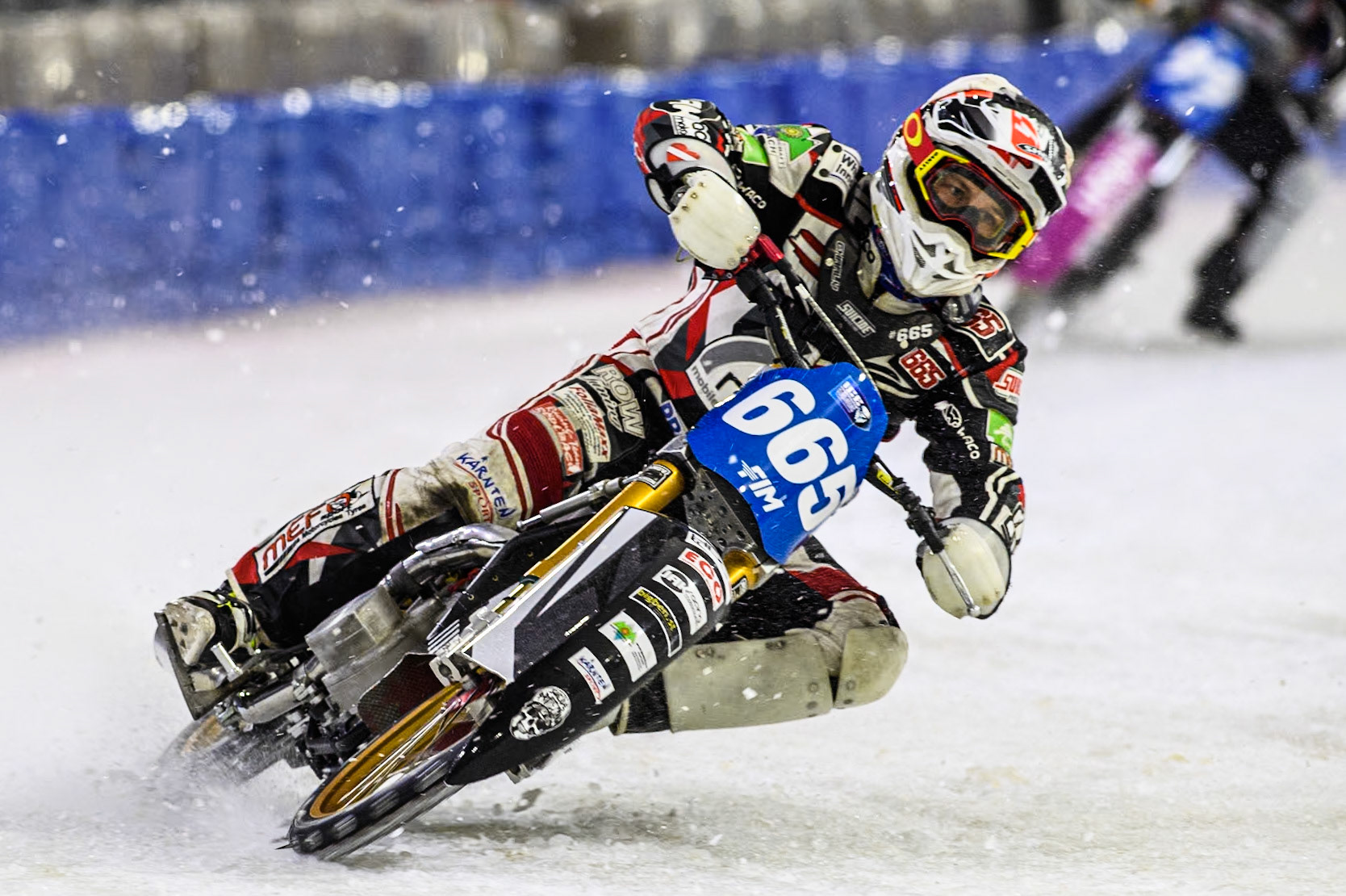 Austria's Charly Ebner (665) in action during the FIM Ice Speedway Gladiators World Championship Final 3 at Ice Rink Thialf, Heerenveen on Saturday 6th April 2024. (Photo: Ian Charles | MI News)