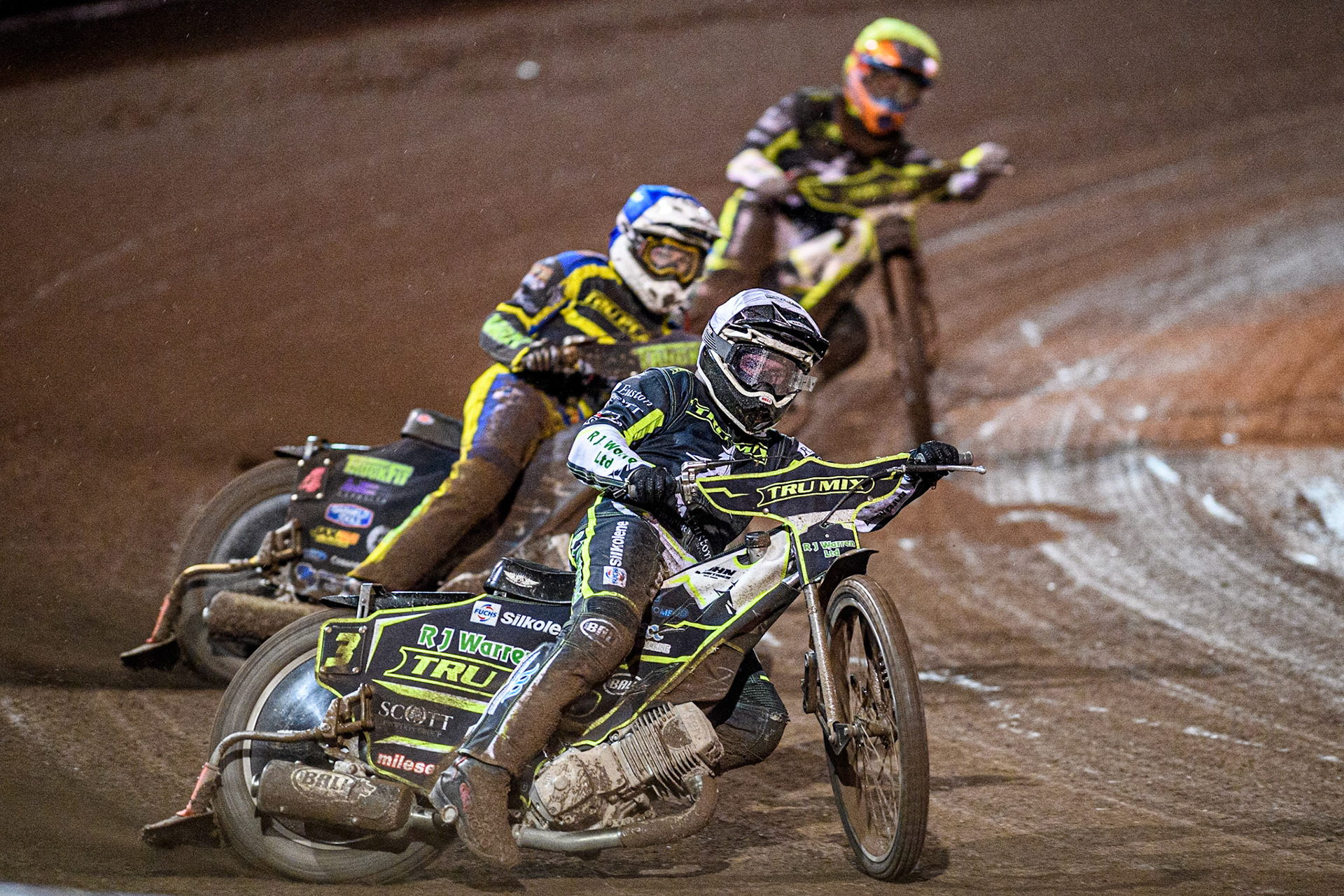 Danny King (White) leads  Josh Pickering (Blue) and Keynan Rew (Yellow) during the Sports Insure Premiership Grand Final Second Leg match between Sheffield Tigers and Ipswich Witches at Owlerton Stadium, Sheffield on Thursday 5th October 2023. (Photo: Ian Charles | MI News)