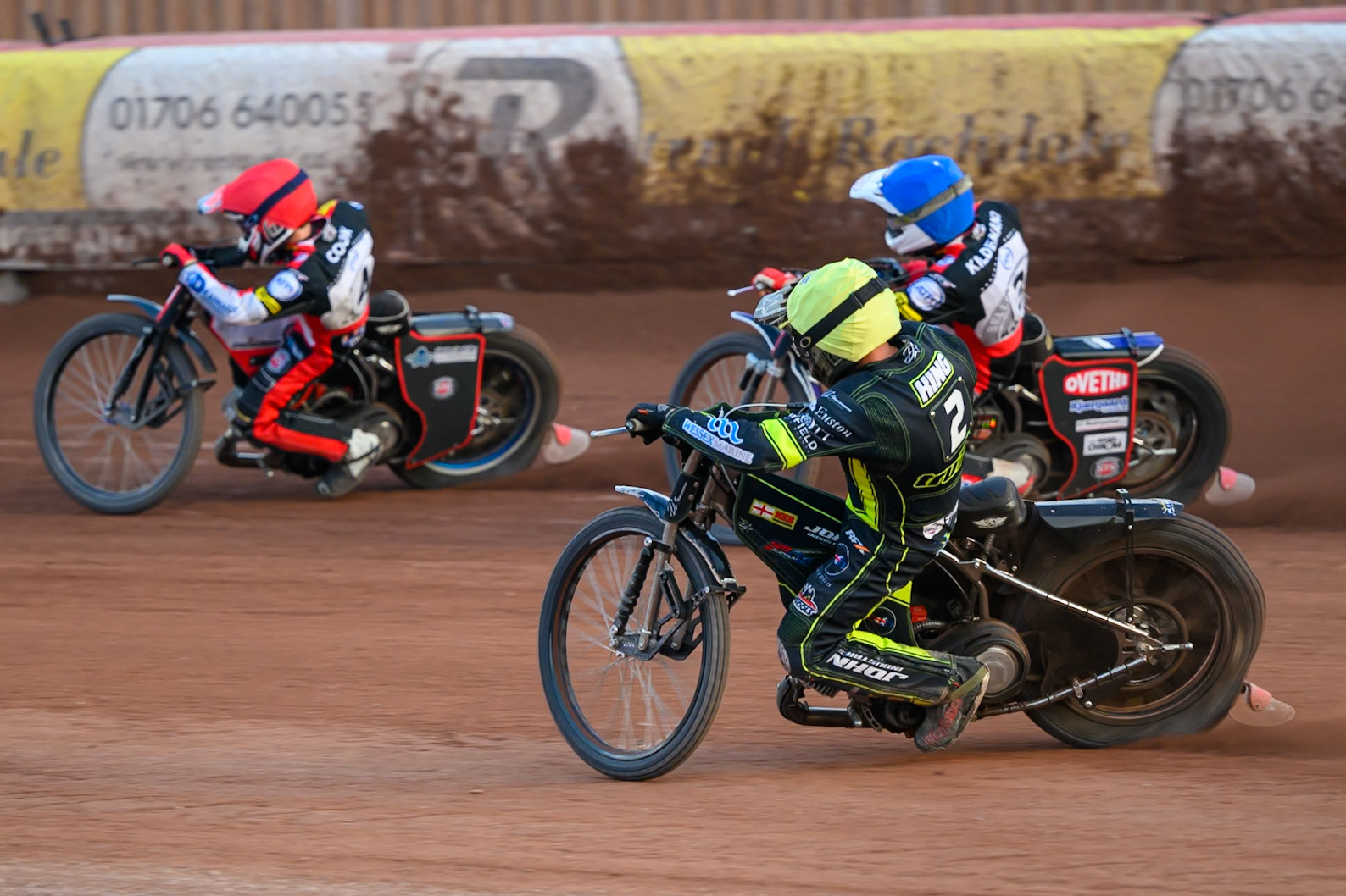 Danny King of Ipswich Witches  rides inside Peter Kildemand of Belle Vue Aces in Blue and Zach Cook of Belle Vue Aces in Red during the Rowe Motor Oil Premiership match between Belle Vue Aces and Ipswich Witches at the National Speedway Stadium, Manchester on Saturday 20th June 2026. (Photo: Ian Charles | MI News)