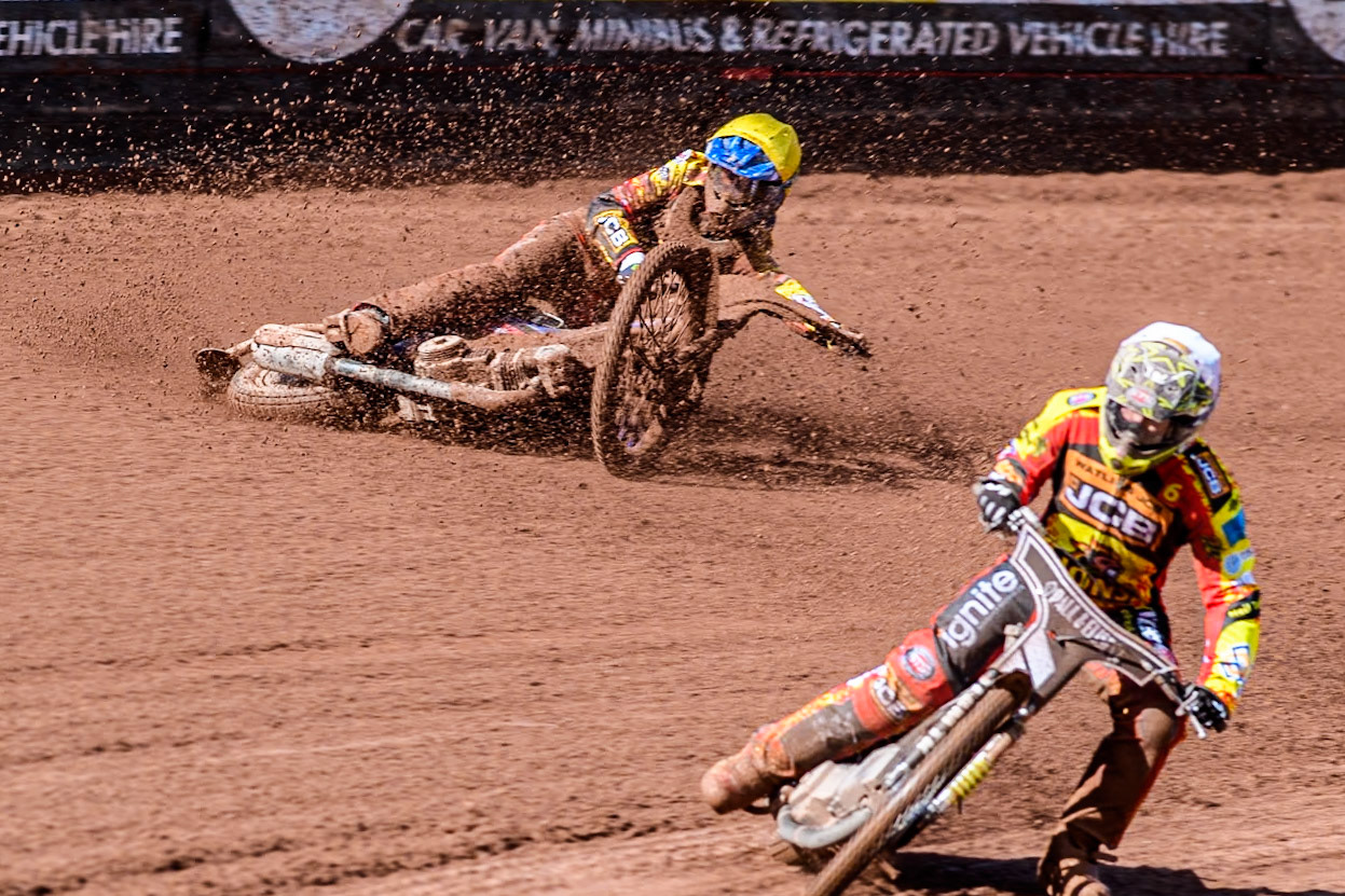 Leicester Lion Cubs' Sonny Springer  (Yellow) falls behind team mate Leicester Lion Cubs' Luke Crang (White) during the WSRA  National Development League match between Belle Vue Colts and Leicester Lion Cubs at the National Speedway Stadium, Manchester on Friday 29th March 2024. (Photo: Ian Charles | MI News)