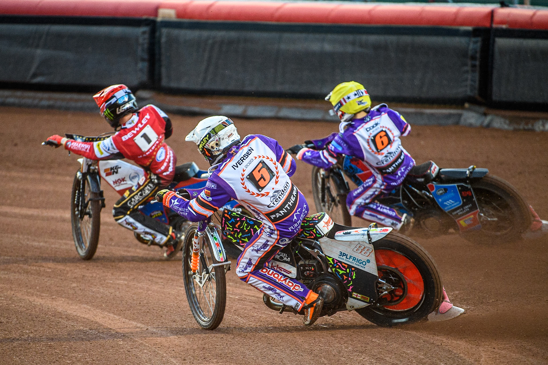 Niels-Kristian Iversen  (White) and Ben Cook  (Yellow) chase Dan Bewley  (Red) during the SGB Premiership match between Belle Vue Aces and Peterborough at the National Speedway Stadium, Manchester on Monday 24th April 2023. (Photo: Ian Charles | MI News)