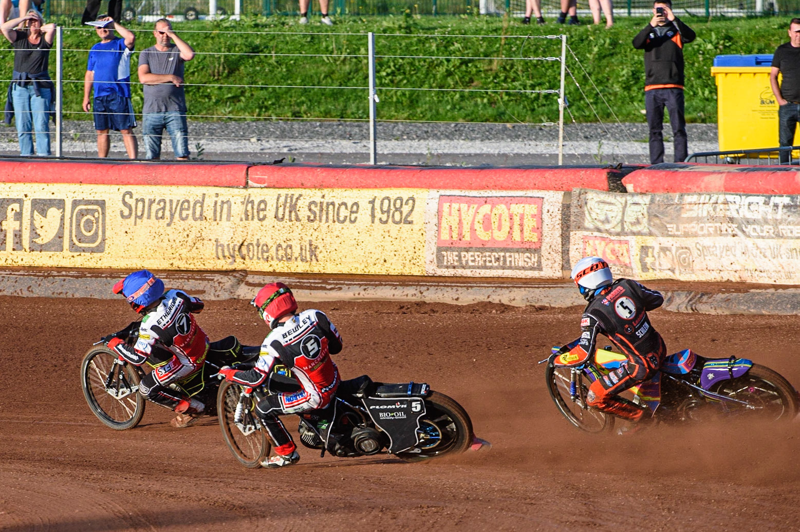 MANCHESTER, UK. JULY 15TH   Jye Etheridge  (Blue) and Dan Bewley  (Red) inside Rory Schlein  (White) during the SGB Premiership match between Belle Vue Aces and Wolverhampton Wolves at the National Speedway Stadium, Manchester on Thursday 15th July 2021. (Credit: Ian Charles | MI News)