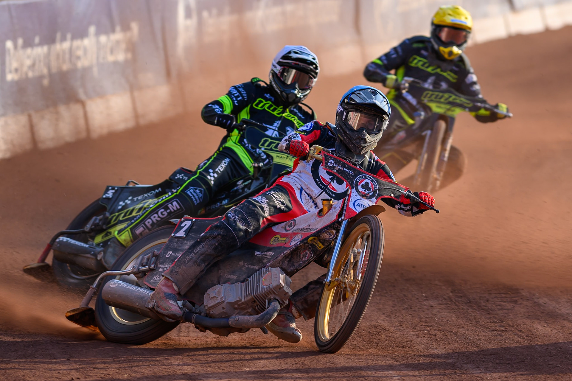 Norick Blödorn of Belle Vue Aces in Blue leading Tobiasz Musielak of Ipswich Witches in White and Philip Hellstrom-Bangs of Ipswich Witches in Yellow during the Rowe Motor Oil Premiership match between Belle Vue Aces and Ipswich Witches at the National Speedway Stadium, Manchester on Saturday 20th June 2026. (Photo: Ian Charles | MI News)