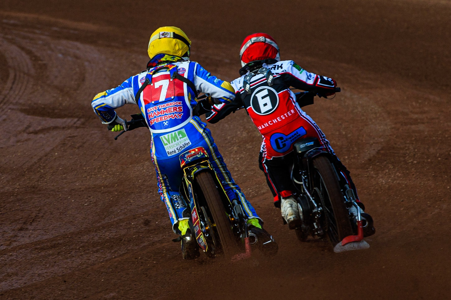 MANCHESTER, UK. JULY 23RD Nathan Ablitt  (Yellow) chases Sam McGurk   (Red) during the National Development League match between Belle Vue Colts and Eastbourne Seagulls at the National Speedway Stadium, Manchester on Friday 23rd July 2021. (Credit: Ian Charles | MI News)