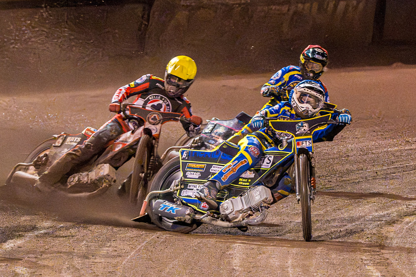 Jye Etheridge of Sheffield Tigers in Blue leading Tate Zischke of Belle Vue Aces in Yellow and Josh Pickering of Sheffield Tigers in Red  during the Rowe Motor Oil Premiership Grand Final 1st Leg match between Sheffield Tigers and Belle Vue Aces at Owlerton Stadium, Sheffield on Monday 12th October 2026. (Photo: Ian Charles | MI News)