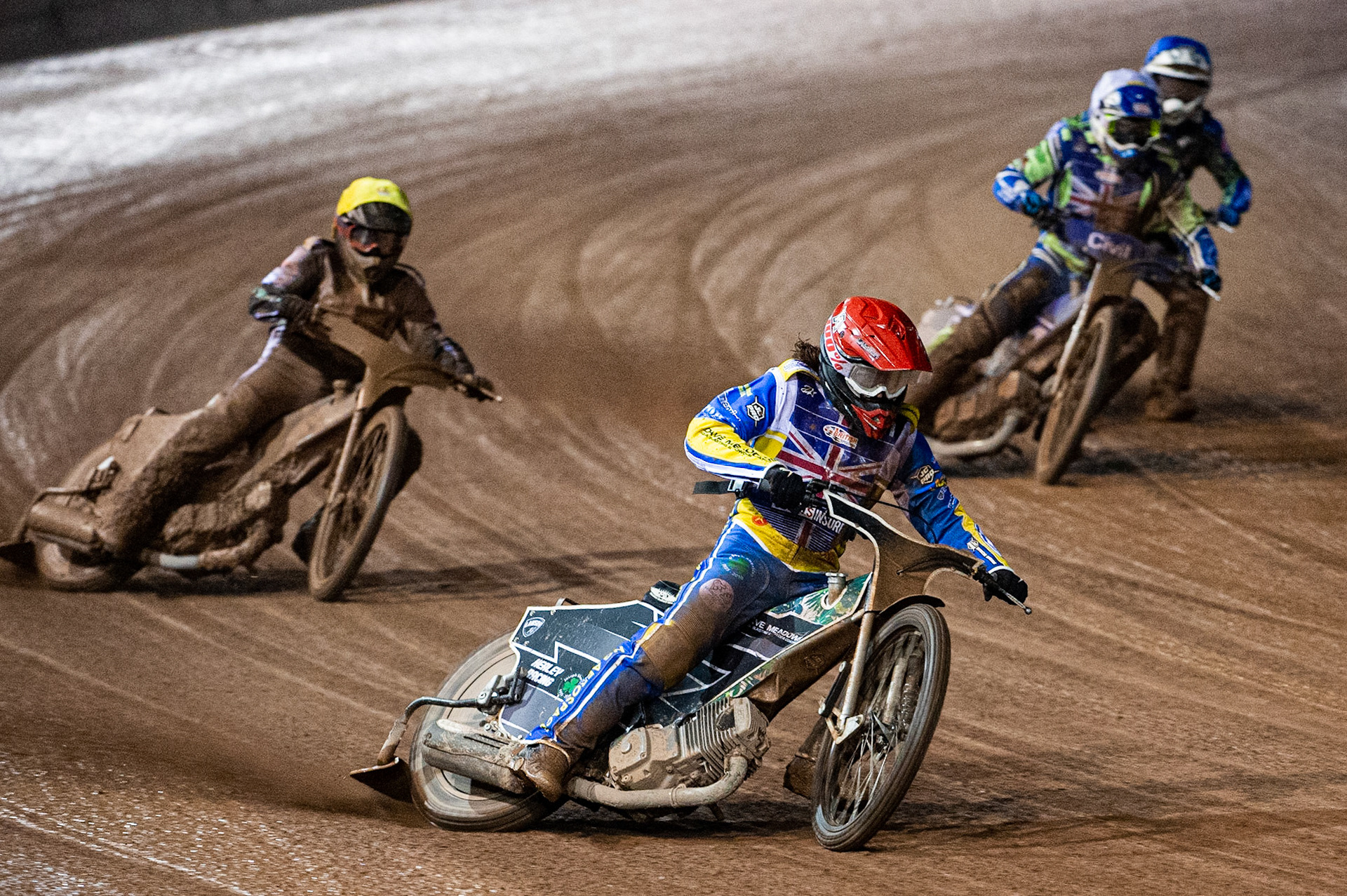 Photo: Ian CharlesRichard Lawson  (Red)  leads  Danny King   (Yellow) Richie Worrall   (White)  and Paul Starke  (Blue) Sports Insure British Speedway Championship Final, National Speedway Stadium, Manchester Monday  28  September  2020