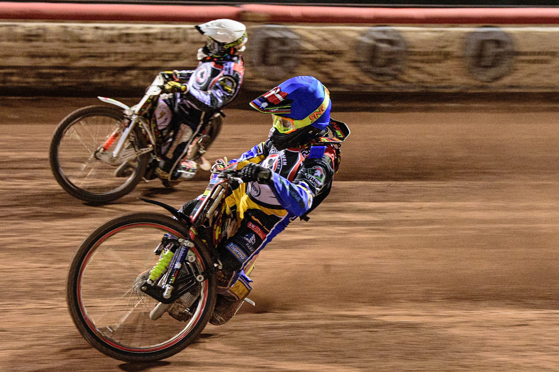 MANCHESTER, UK. MAR 21ST. Michael Palm-Toft (Blue) inside Niels-Kristian Iversen (White) during the ATPI Peter Craven Memorial Trophy at the National Speedway Stadium, Manchester on Monday 21st March 2022. (Credit: Ian Charles | MI News)
