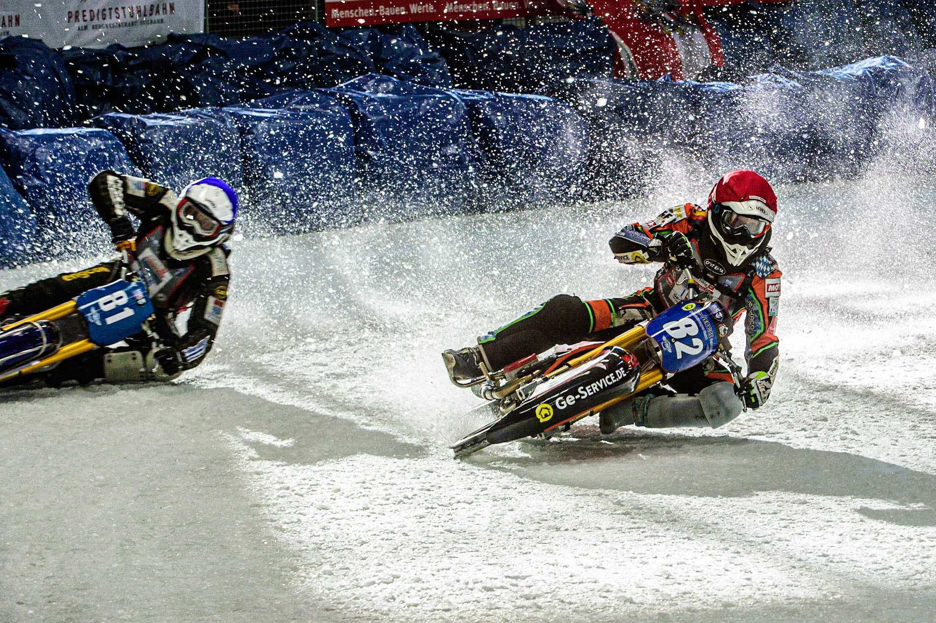 Markus Jell (82) (Red) inside Jimmy Olsen (81) (Blue) during the Ice Speedway Gladiators World Championship Final 1 at Max-Aicher-Arena, Inzell, Germany on Saturday 18th March 2023. (Photo: Ian Charles | MI News)