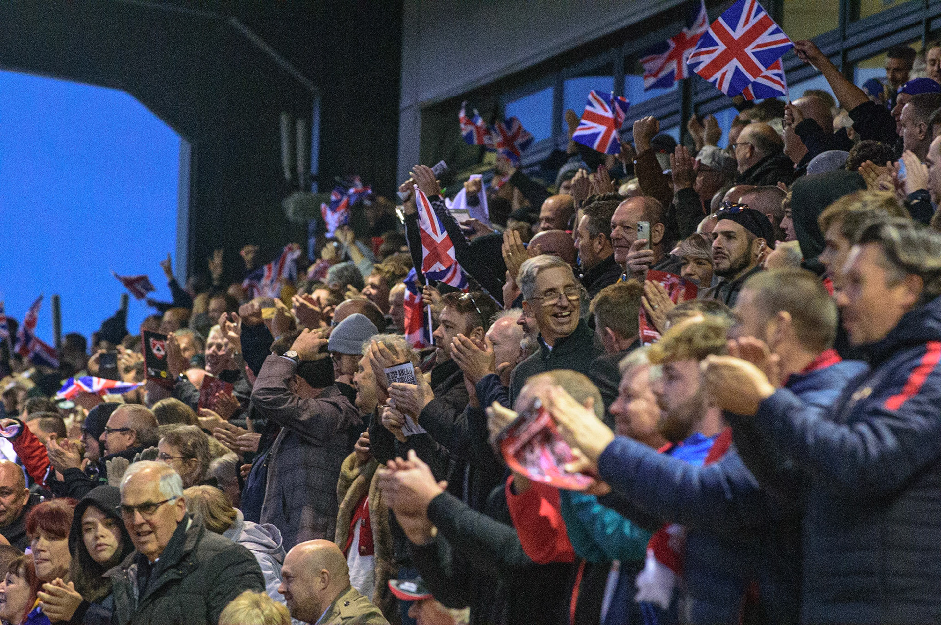 MANCHESTER, UK. OCT 17TH British fans celebrate during the Monster Energy FIM Speedway of Nations at the National Speedway Stadium, Manchester on Sunday  17th October 2021. (Credit: Ian Charles | MI News)