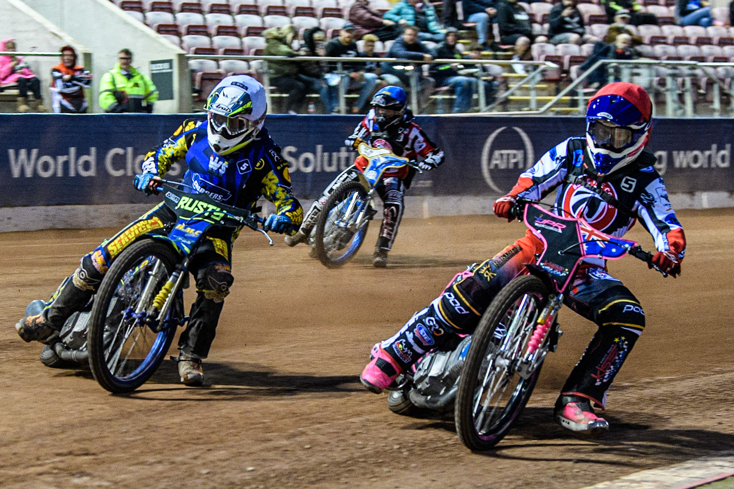 James Pearson  (Red) inside Ryan Kinsley  (White) with Jack Shimelt (Blue) behind during the National Development League match between Belle Vue Colts and Oxford Chargers at the National Speedway Stadium, Manchester on Friday 12th May 2023. (Photo: Ian Charles | MI News)