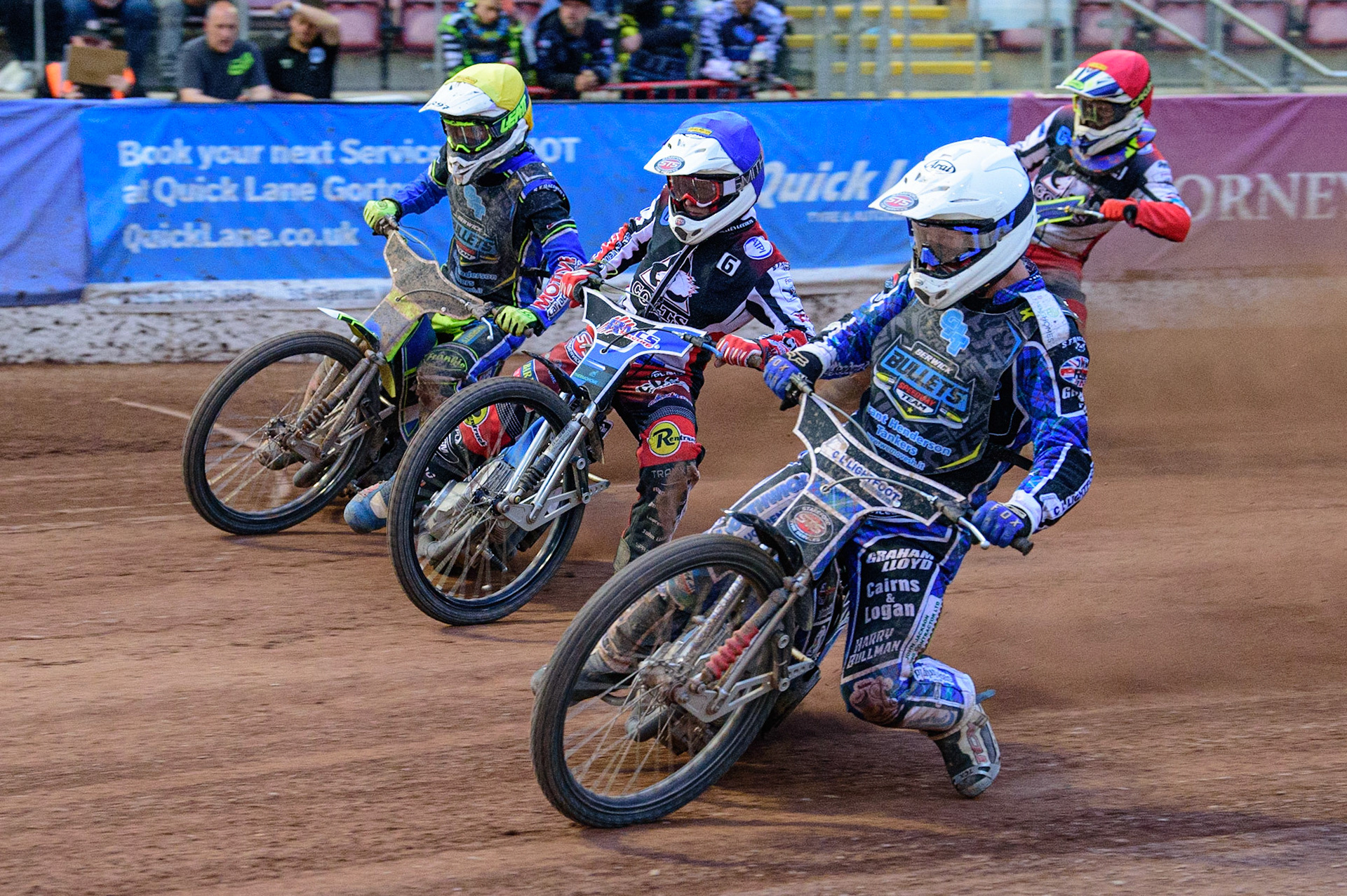 MANCHESTER, UK. JUN 24TH  Greg Blair  (White) inside Archie Freeman  (Blue) Ben Rathbone  (Yellow) with Nathan Ablitt  (Red) behind during the National Development League match between Belle Vue Colts and Berwick Bullets at the National Speedway Stadium, Manchester on Friday 24th June 2022. (Credit: Ian Charles | MI News)