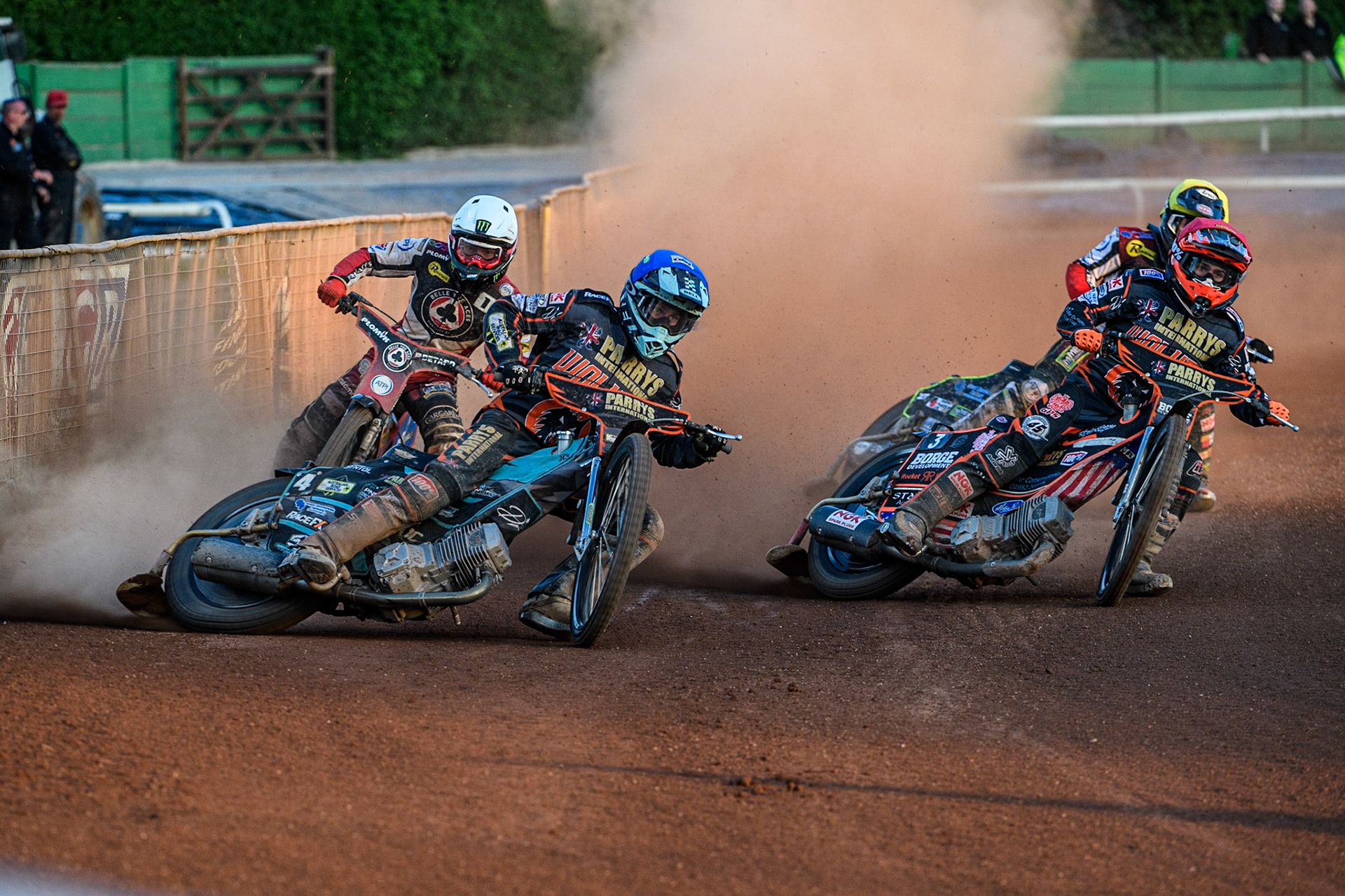 Ryan Douglas (Blue) and team mate Luke Becker (Red) lead Dan Bewley (White) and Tom Brennan (Yellow) during the Sports Insure Premiership match between Wolverhampton Wolves and Belle Vue Aces at Monmore Green Stadium, Wolverhampton on Monday 29th May 2023. (Photo: Ian Charles | MI News)