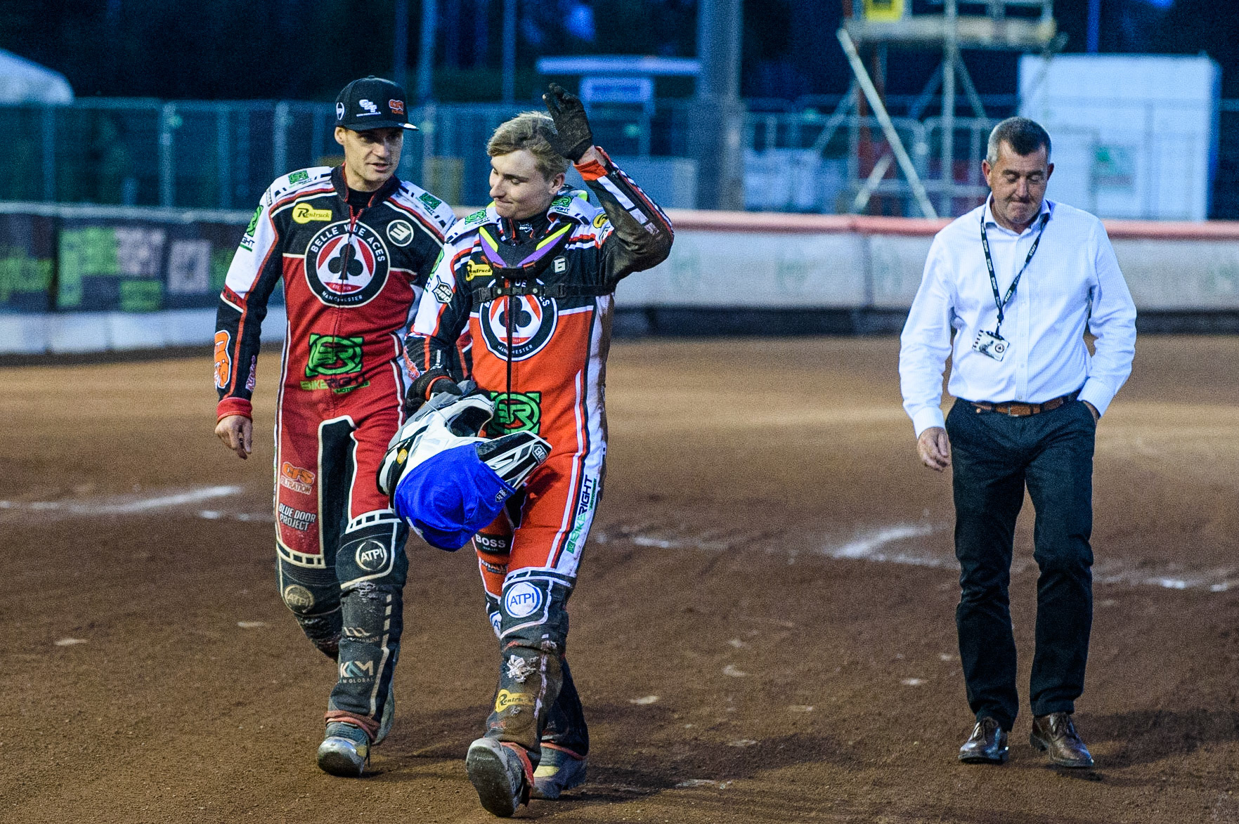 MANCHESTER UKTom Brennan (centre) walks back to the pits and acknowledges the crowd after his fall. With him are Belle Vue Captain Steve Worrall (left) and Belle Vue CEO Adrian Smith (right) during the SGB Premiership match between Belle Vue Aces and Ipswich Witches at the National Speedway Stadium, Manchester on Monday 2nd August 2021. (Credit: Ian Charles | MI News)