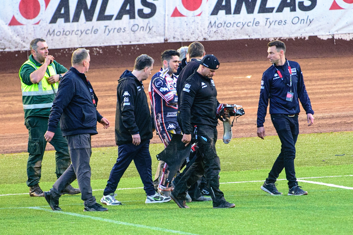 MANCHESTER, UK. OCT 16TH Tai Woffinden walks away from his crash with members of the Team GB support staff and medical staff during the Monster Energy FIM Speedway of Nations at the National Speedway Stadium, Manchester on Saturday  16th October 2021. (Credit: Ian Charles | MI News)