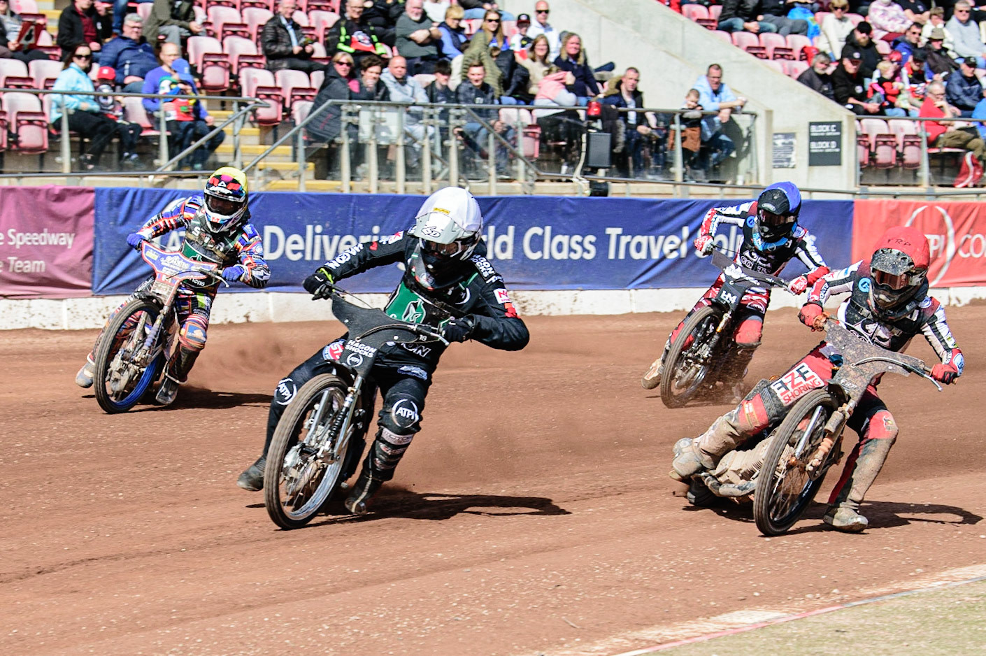 MANCHESTER, UK. APR 15TH  Dan Gilkes (White) leads Jack Smith  (Red) Henry Atkins  (Yellow) and Harry McGurk  (Blue)  during the National Development League match between Belle Vue Colts and Plymouth Centurions at the National Speedway Stadium, Manchester on Friday 15th April 2022. (Credit: Ian Charles | MI News)