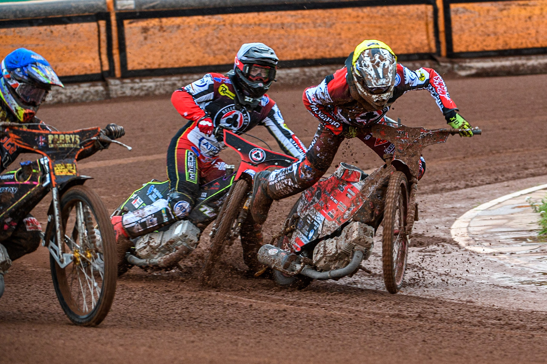 Connor Bailey (Yellow) locks up and falls ahead of team mate Tom Brennan (White) during the Sports Insure Premiership match between Wolverhampton Wolves and Belle Vue Aces at Monmore Green Stadium, Wolverhampton on Monday 10th July 2023. (Photo: Ian Charles | MI News)