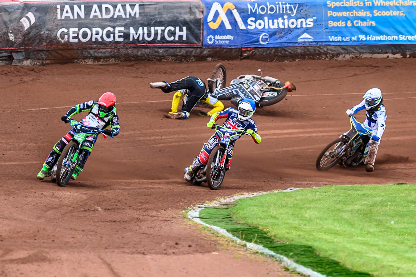 Noel Wahlquist of Sweden falls on the second turn during the FIM SGP2 Qualifying Round at the Peugeot Ashfield Stadium in Glasgow on Saturday 24th May 2025. (Photo: Ian Charles | MI News)