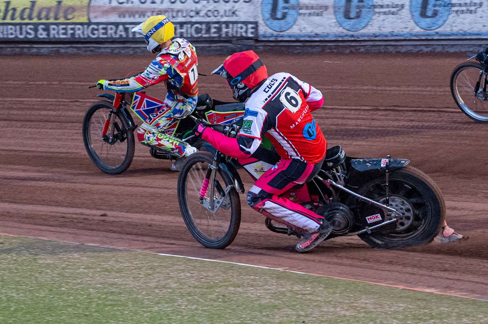 MANCHESTER, UK. JULY 2ND  Sam Woolley  (Red) chases Jake Mulford  (Yellow) during the National Development League match between Belle Vue Colts and Kent Royals at the National Speedway Stadium, Manchester on Friday 2nd July 2021. (Credit: Ian Charles | MI News)