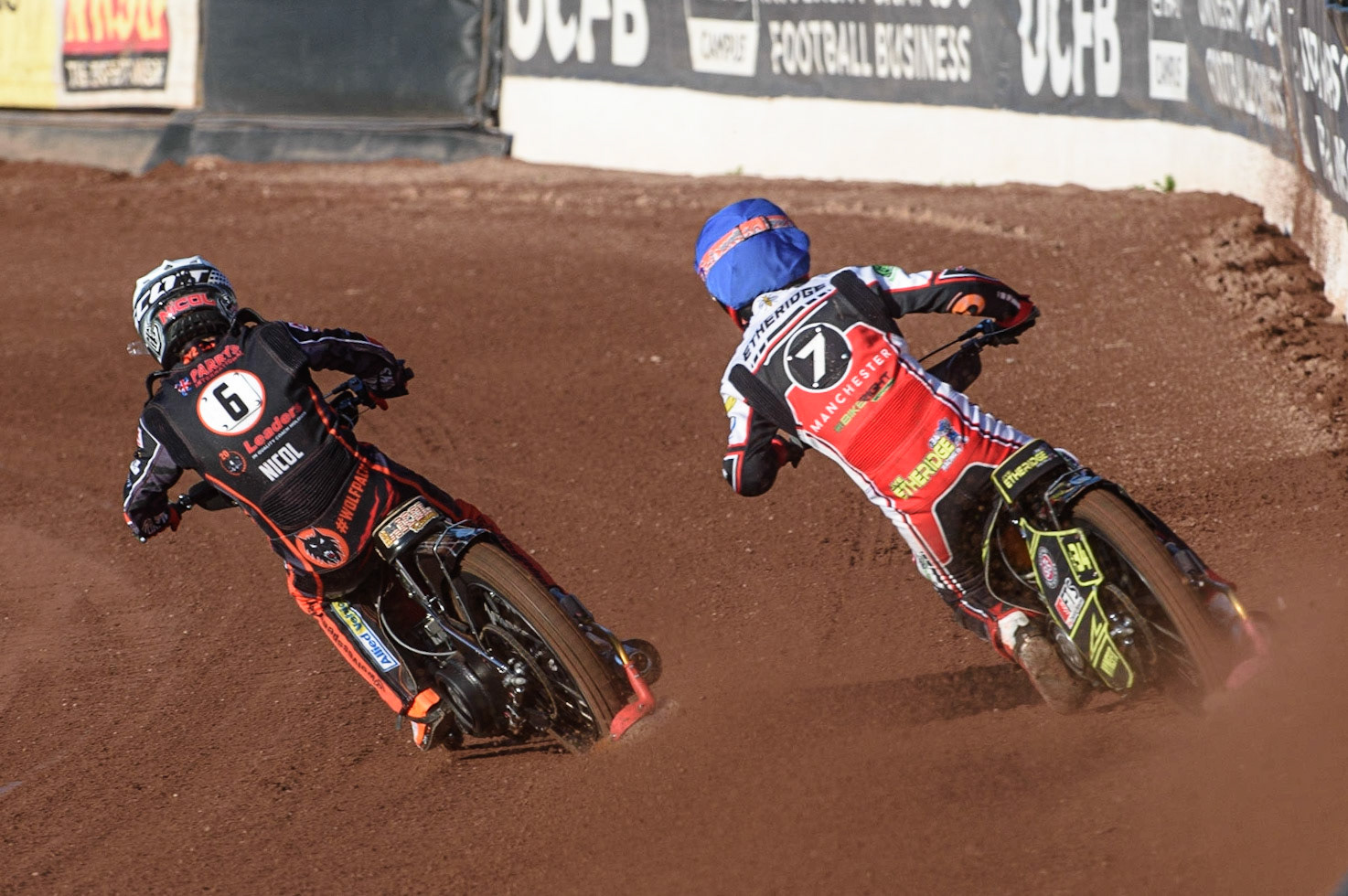 MANCHESTER, UK. JULY 15TH   Jye Etheridge (Blue) chases Broc Nicol  (White) during the SGB Premiership match between Belle Vue Aces and Wolverhampton Wolves at the National Speedway Stadium, Manchester on Thursday 15th July 2021. (Credit: Ian Charles | MI News)