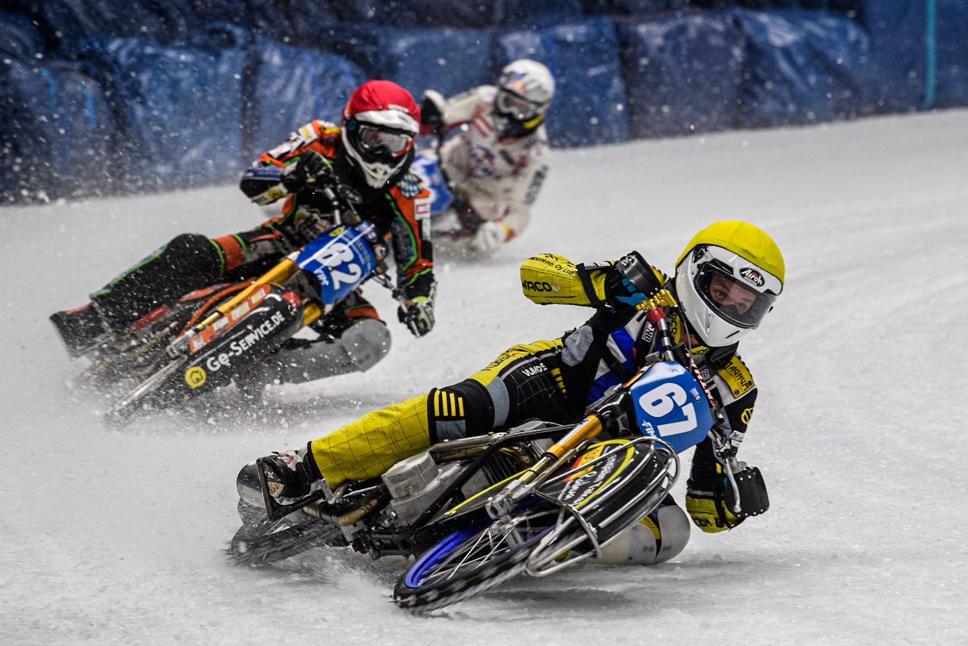 Finland's Heikki Huusko (67) (Yellow) leads  Germany's Markus Jell (82) (Red) and Austria's Franz Zorn (100) (White) during the FIM Ice Speedway Gladiators World Championship Final 1 at the Max-Aicher-Arena, Inzell on Saturday 23 March 2024. (Photo: Ian Charles | MI News)