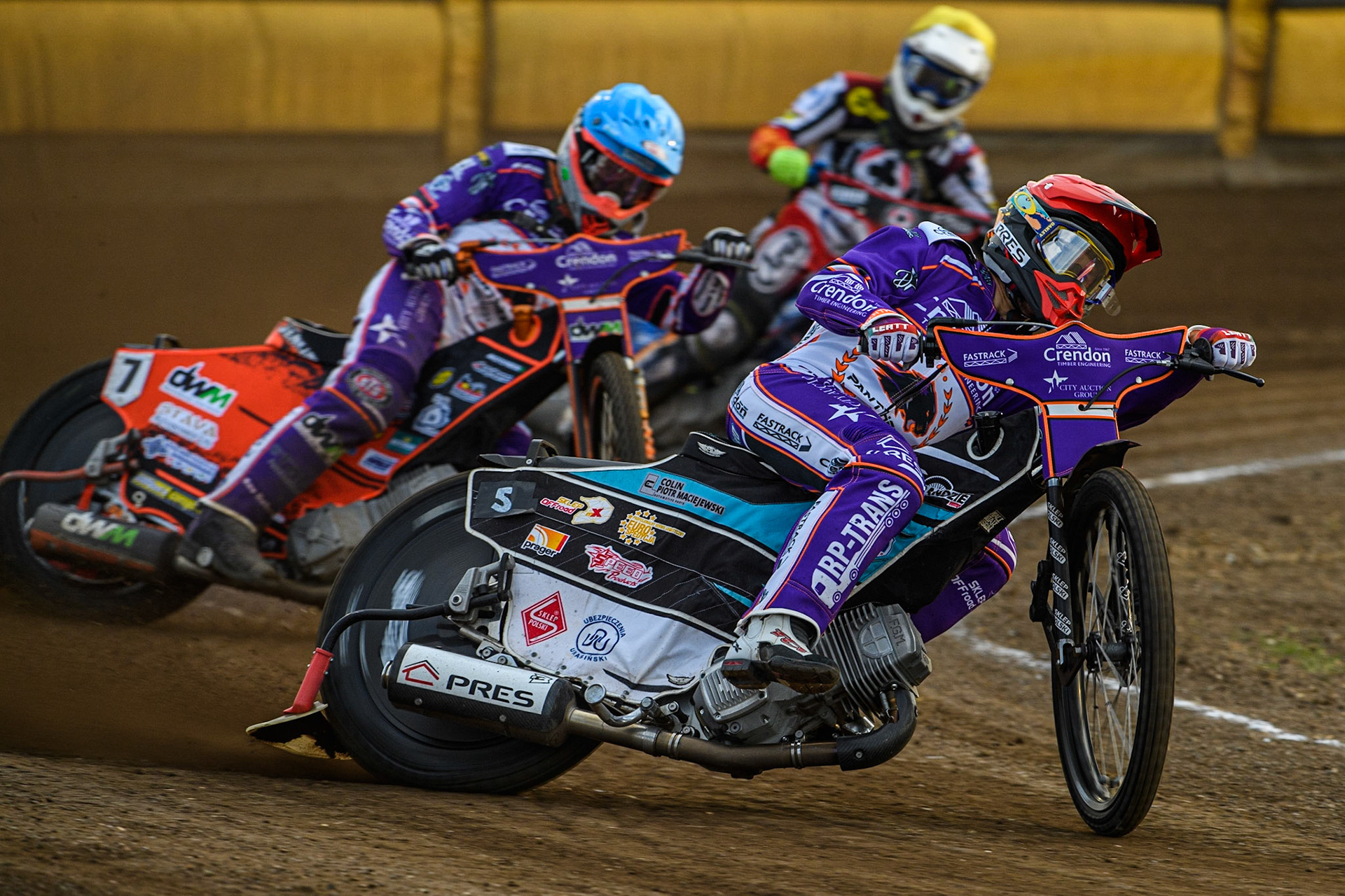 Vadim Tarasenko (Red) and Jordan Jenkins (Blue) lead Jake Mulford (Yellow) during the Sports Insure Premiership match between Peterborough and Belle Vue Aces at East of England Showground, Peterborough on Monday 26th June 2023. (Photo: Ian Charles | MI News)