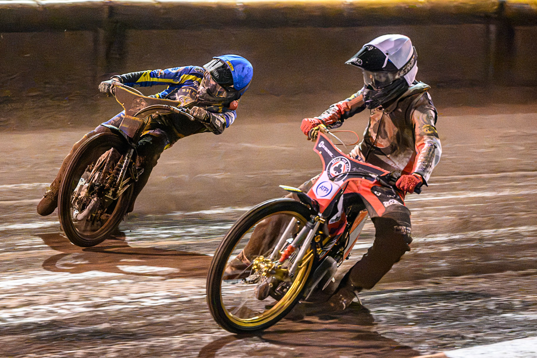 Norick Blodorn of Belle Vue Aces in White on the inside of Luke Killeen of Sheffield Tigers in Blue during the Rowe Motor Oil Premiership Grand Final 1st Leg match between Sheffield Tigers and Belle Vue Aces at Owlerton Stadium, Sheffield on Monday 12th October 2026. (Photo: Ian Charles | MI News)