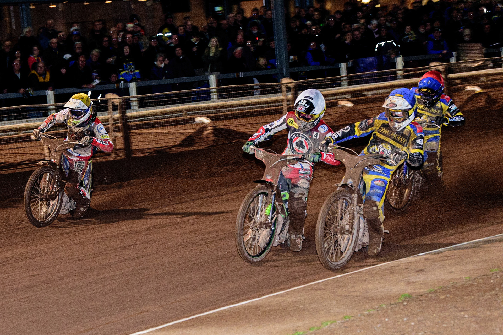 Lewis Kerr  (Blue) inside Charles Wright  (White) and Tom Brennan  (Yellow) with Kyle Howarth  (Red) behind during the Sheffield Tigers vs Belle Vue Aces meeting in the SGP Premiership at Owlerton Stadium, Sheffield on Thursday 23rd March 2023. (Photo: Ian Charles | MI News)