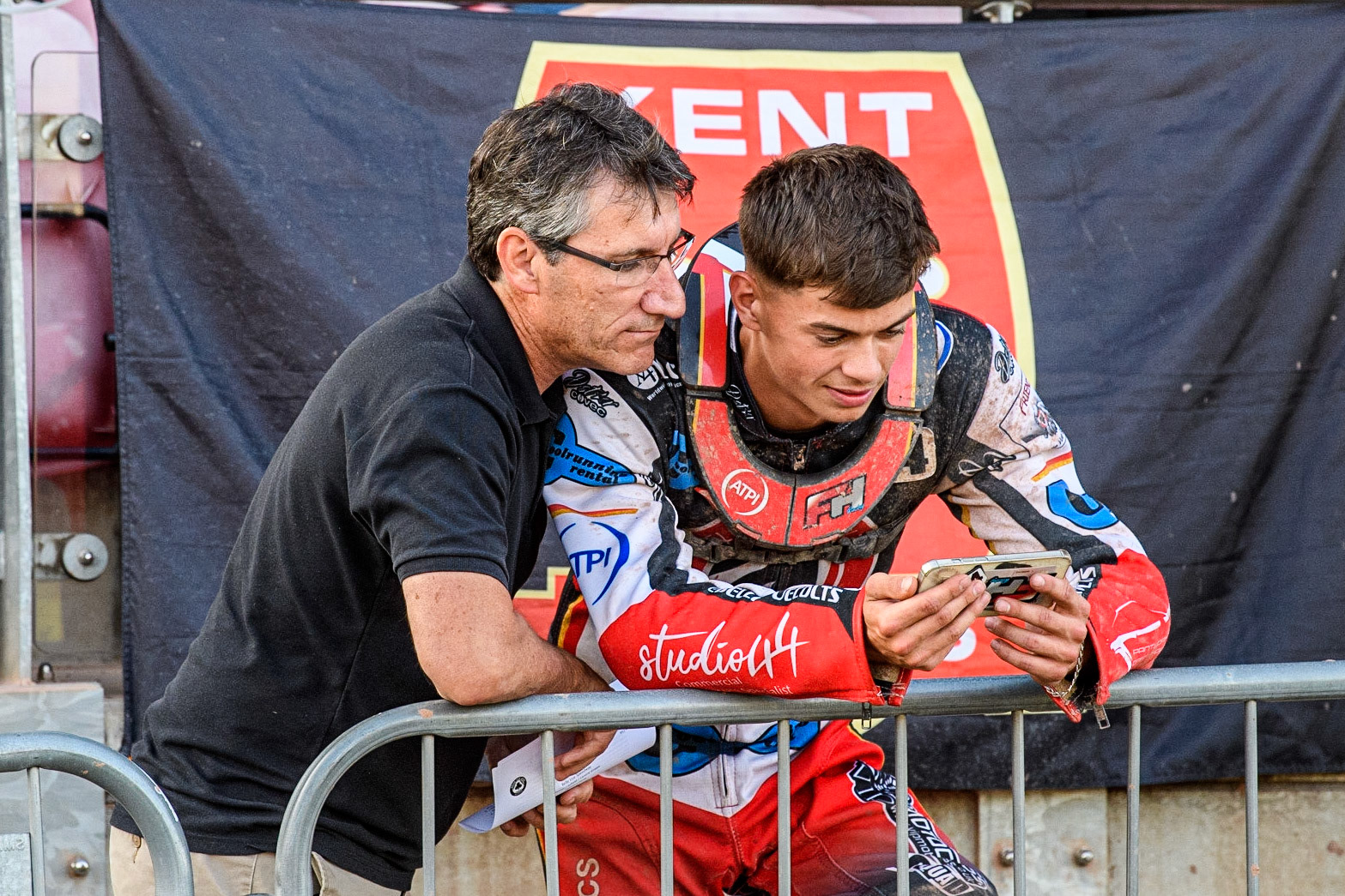 Belle Vue CEO Mark Lemon (left) with Freddy Hodder watching the video of the race where Hodder was excluded during the National Development League match between Belle Vue Colts and Kent Royals at the National Speedway Stadium, Manchester on Friday 7th July 2023. (Photo: Ian Charles | MI News)