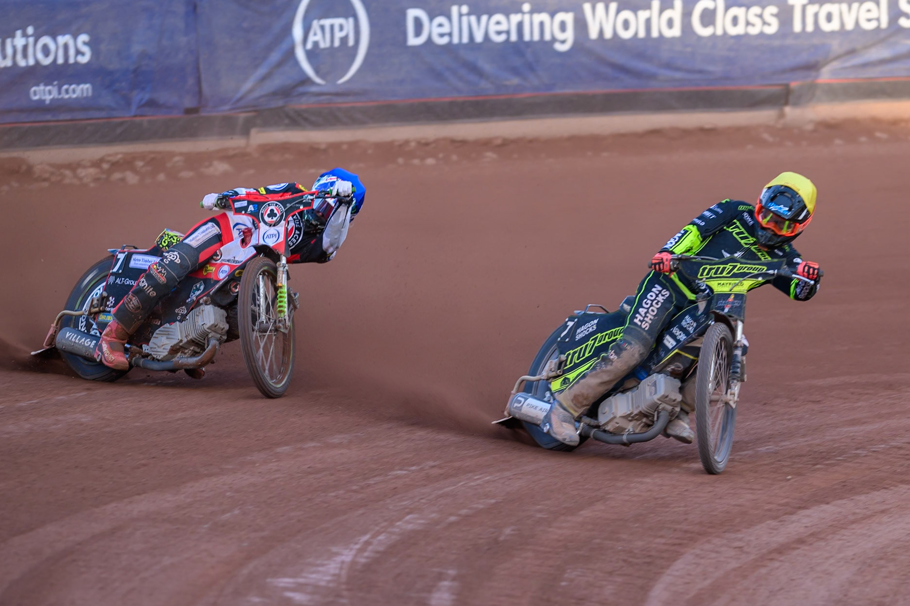 Jason Edwards of Ipswich Witches in Yellow rides inside William Cairns of Belle Vue Aces in Blue during the Rowe Motor Oil Premiership match between Belle Vue Aces and Ipswich Witches at the National Speedway Stadium, Manchester on Saturday 20th June 2026. (Photo: Ian Charles | MI News)