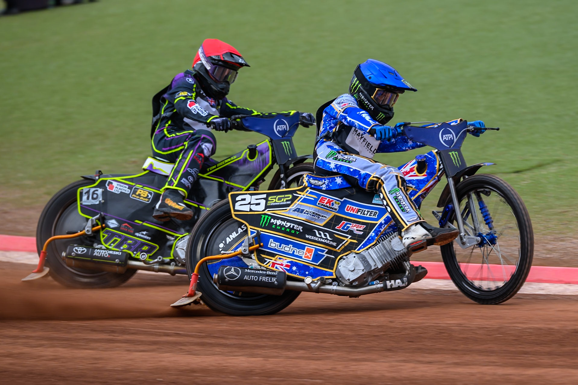 Jack Holder (25) of Australia in Blue leading Wild Card Tom Brennan (16) of Great Britain in Red in the Sprint Race during the ATPI  FIM Speedway GP of Manchester at the National Speedway Stadium, Manchester on Friday 5th June 2026. (Photo: Ian Charles | MI News)