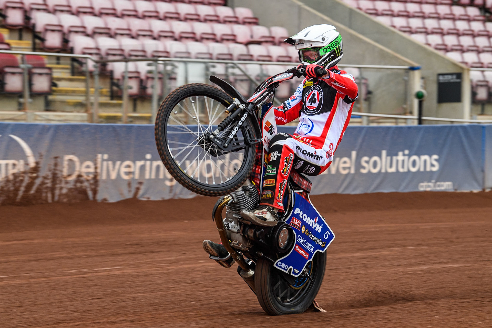 Belle Vue Aces' rider Dan Bewley pulls a wheelie during the Belle Vue Aces Media Day at the National Speedway Stadium, Manchester on Monday 11th March 2024. (Photo: Ian Charles | MI News)