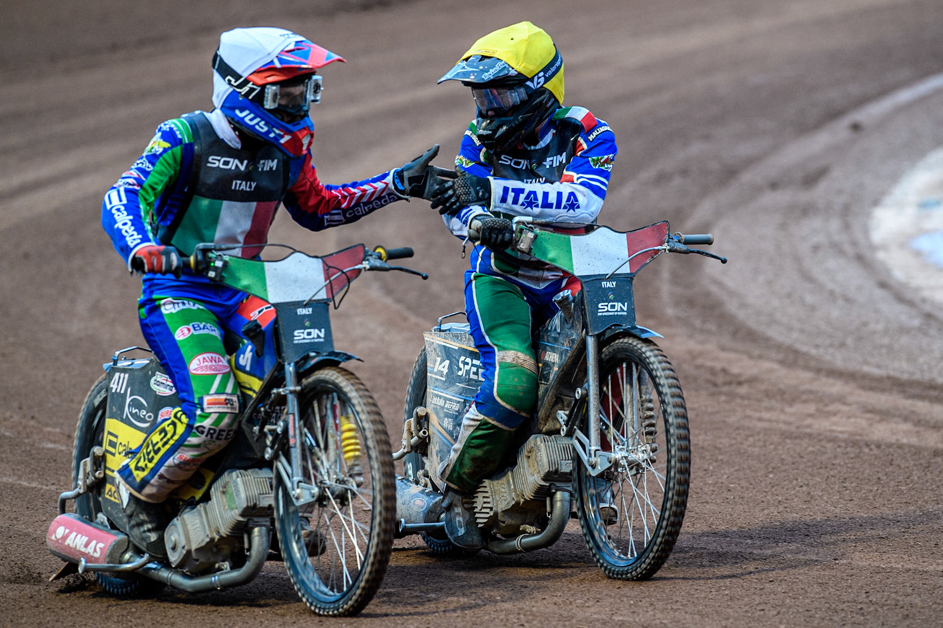 Paco Castagna of Italy in White and Nicolas Vicentin of Italy after their final heat during the Monster Energy FIM Speedway of Nations Semi-Final 1 at the National Speedway Stadium, Manchester on Tuesday 9th July 2024. (Photo: Ian Charles | MI News)