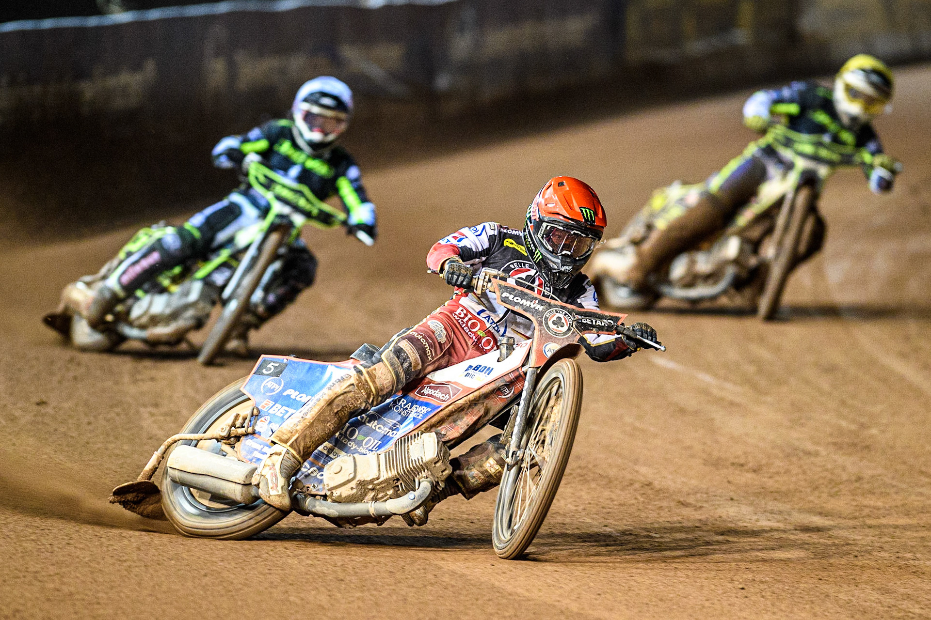 Brady Kurtz (Red) leads  Jason Doyle (White) and Keynan Rew (Yellow) during the Sports Insure Premiership Semi Final Playoff 2nd leg match between Belle Vue Aces and Ipswich Witches at the National Speedway Stadium, Manchester on Monday 25th September 2023. (Photo: Ian Charles | MI News)