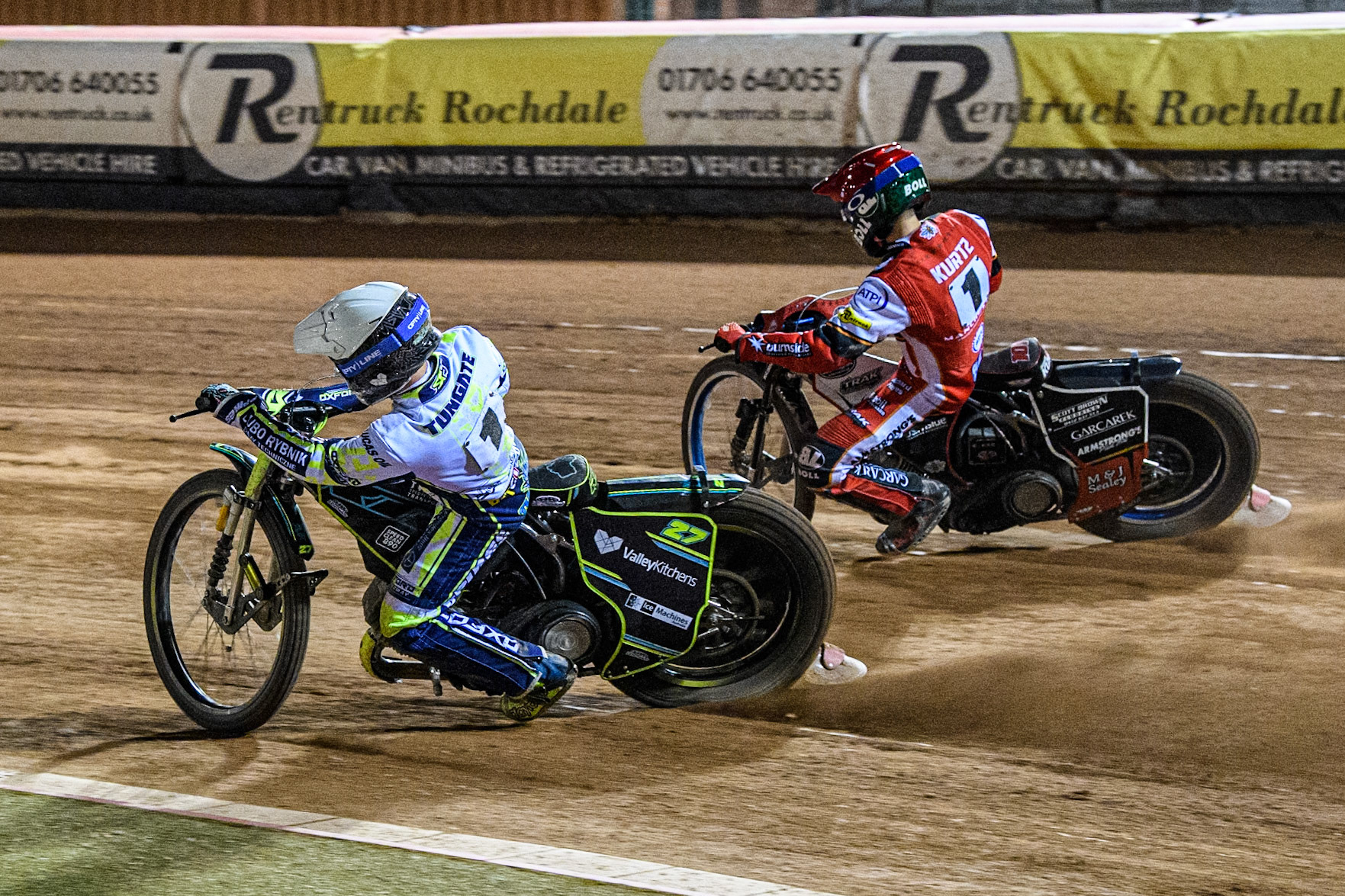 Oxford Spires' Rohan Tungate in White rides inside Belle Vue Aces' Brady Kurtz in Red during the Rowe Motor Oil Premiership match between Belle Vue Aces and Oxford Spires at the National Speedway Stadium, Manchester on Monday 14th April 2025. (Photo: Ian Charles | MI News)