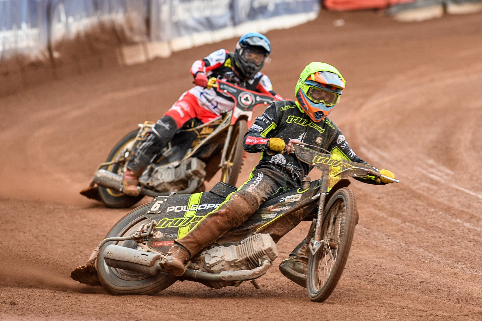 Ipswich Witches' Keynan Rew in Yellow leading Belle Vue Aces' Norick Blodorn  in Blue during the Rowe Motor Oil Premiership match between Belle Vue Aces and Ipswich Witches at the National Speedway Stadium, Manchester on Monday 1st July 2024. (Photo: Ian Charles | MI News)