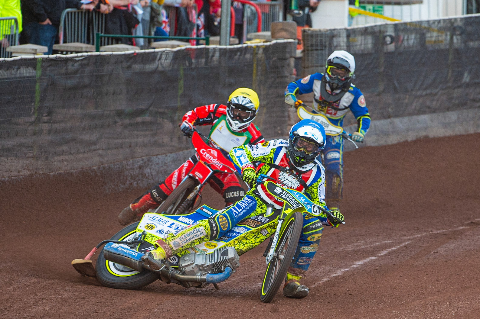 Photo by Ian Charles:

Bartosz Smektała (Blue) leads Rohan Tungate (Yellow) and Ondrej Smetana  (White)

FIM Speedway Grand Prix World Championship - Qualifying Round 1, Peugeot Ashfield Stadium, Glasgow, 8 June 2019