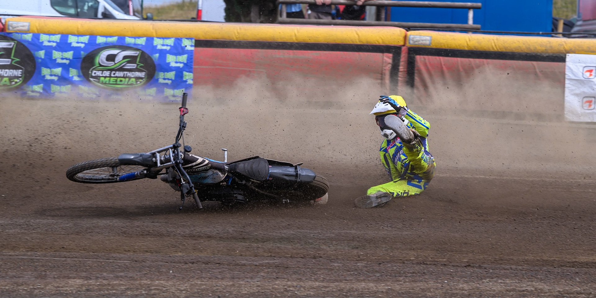 Harry Fletcher of Oxford Chargers in Yellow  falls during the WSRA National Development League match between Buxton Bulls and Oxford Chargers at Hi-Edge Speedway, Buxton on Sunday 2nd August 2026. (Photo: Ian Charles | MI News)