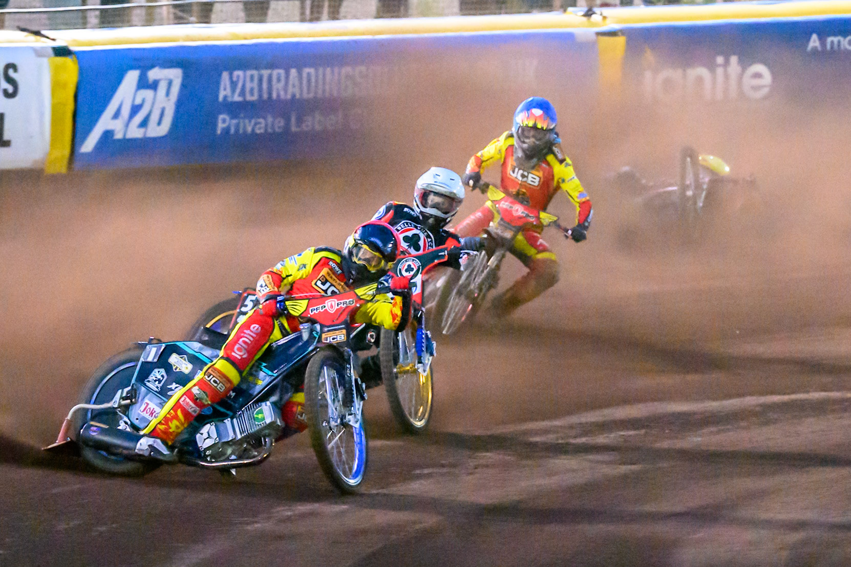 Ryan Douglas of Leicester Lions in Red leading Jason Doyle of Belle Vue Aces  in White  and Drew Kemp of Leicester Lions in Blue  as Tate Zischke of Belle Vue Aces  in Yellow  falls behind them during the Rowe Motor Oil Premiership match between Leicester Lions and Belle Vue Aces at the Hydroscan Arena, Leicester on Monday 7th September 2026. (Photo: Ian Charles | MI News)