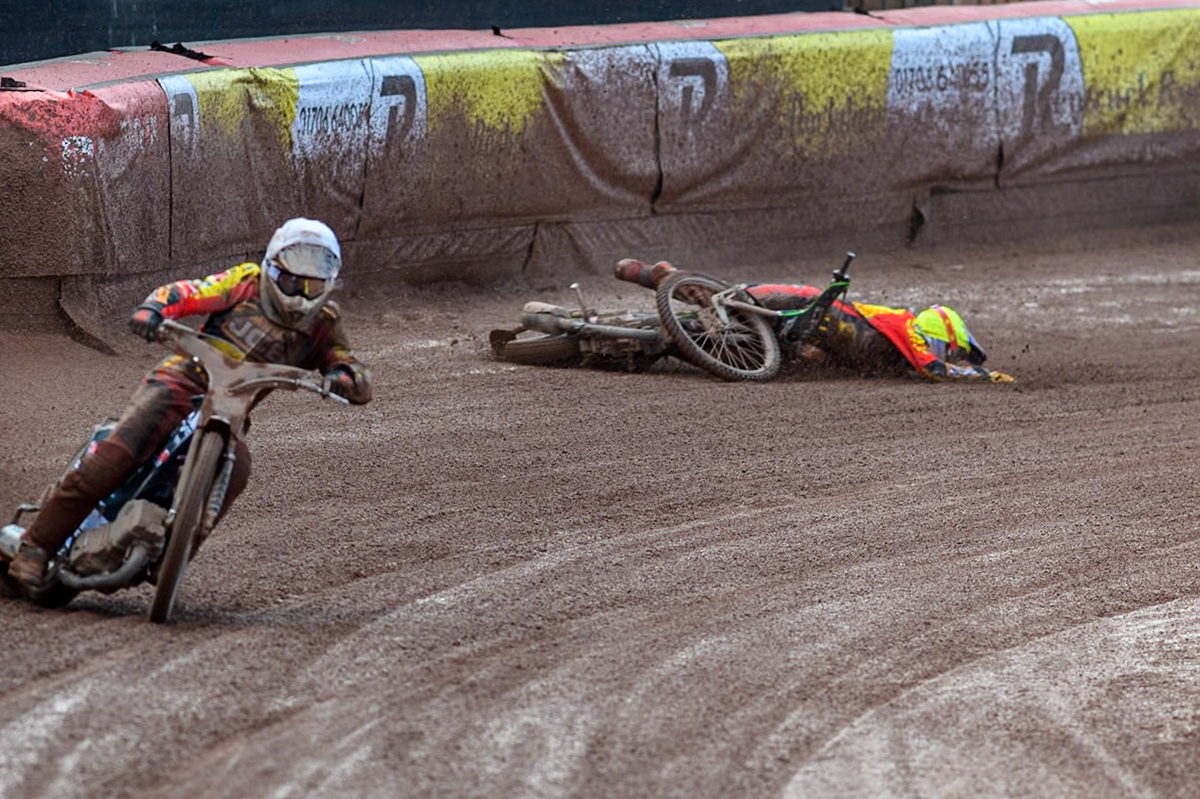 Leicester Lion Cubs' Vinnie Foord is a faller during the WSRA  National Development League match between Belle Vue Colts and Leicester Lion Cubs at the National Speedway Stadium, Manchester on Friday 29th March 2024. (Photo: Ian Charles | MI News)