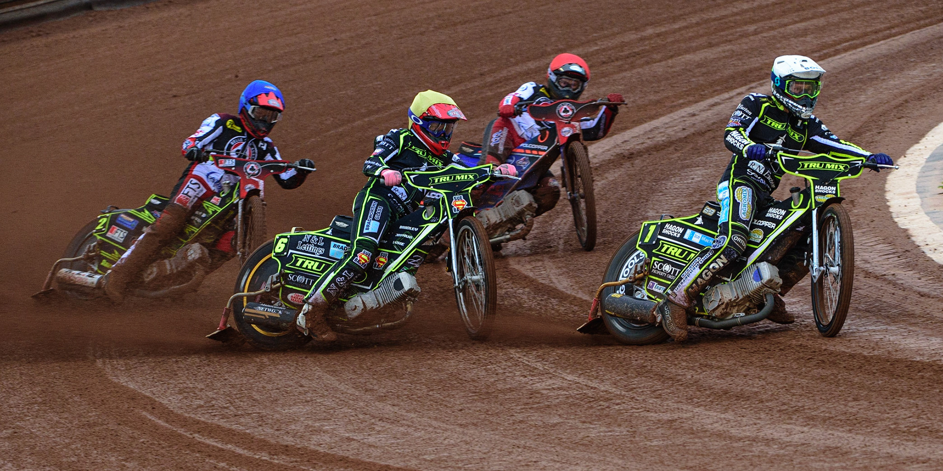 MANCHESTER, UK. JUN 6TH Jason Doyle  (White) and Ben Barker  (Yellow) lead Brady Kurtz  (Red) and Jye Etheridge  (Blue)  during the SGB Premiership match between Belle Vue Aces and Ipswich Witches at the National Speedway Stadium, Manchester on Monday 6th June 2022. (Credit: Ian Charles | MI News)