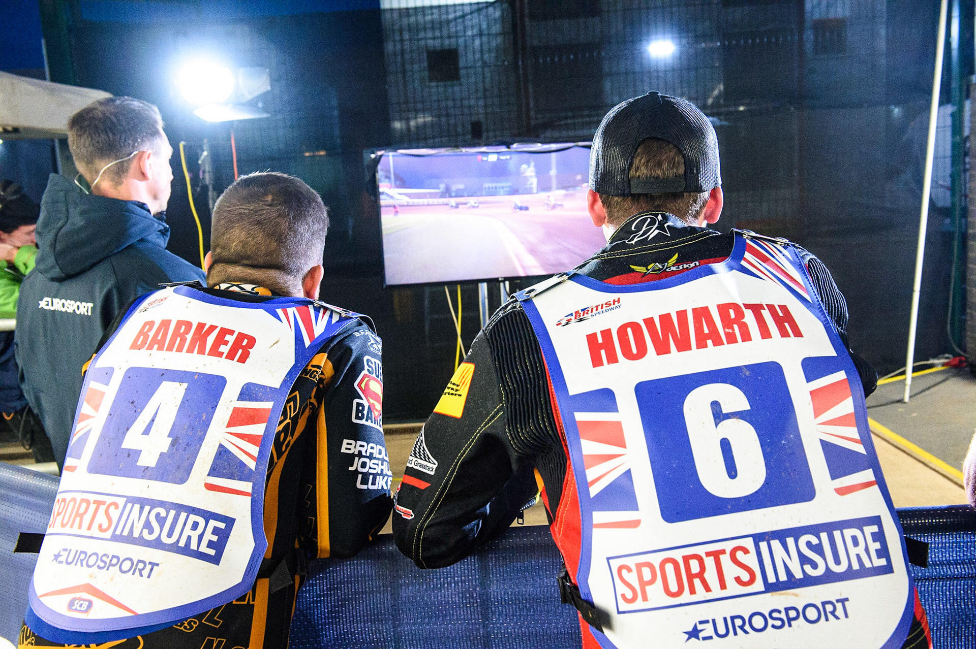 MANCHESTER, UK. AUGUST 16TH   Ben Barker (left) and Kyle Howarth  watch the monitor during the Sports Insure British Speedway Finals at the National Speedway Stadium, Manchester on Monday 16th August 2021. (Credit: Ian Charles | MI News)