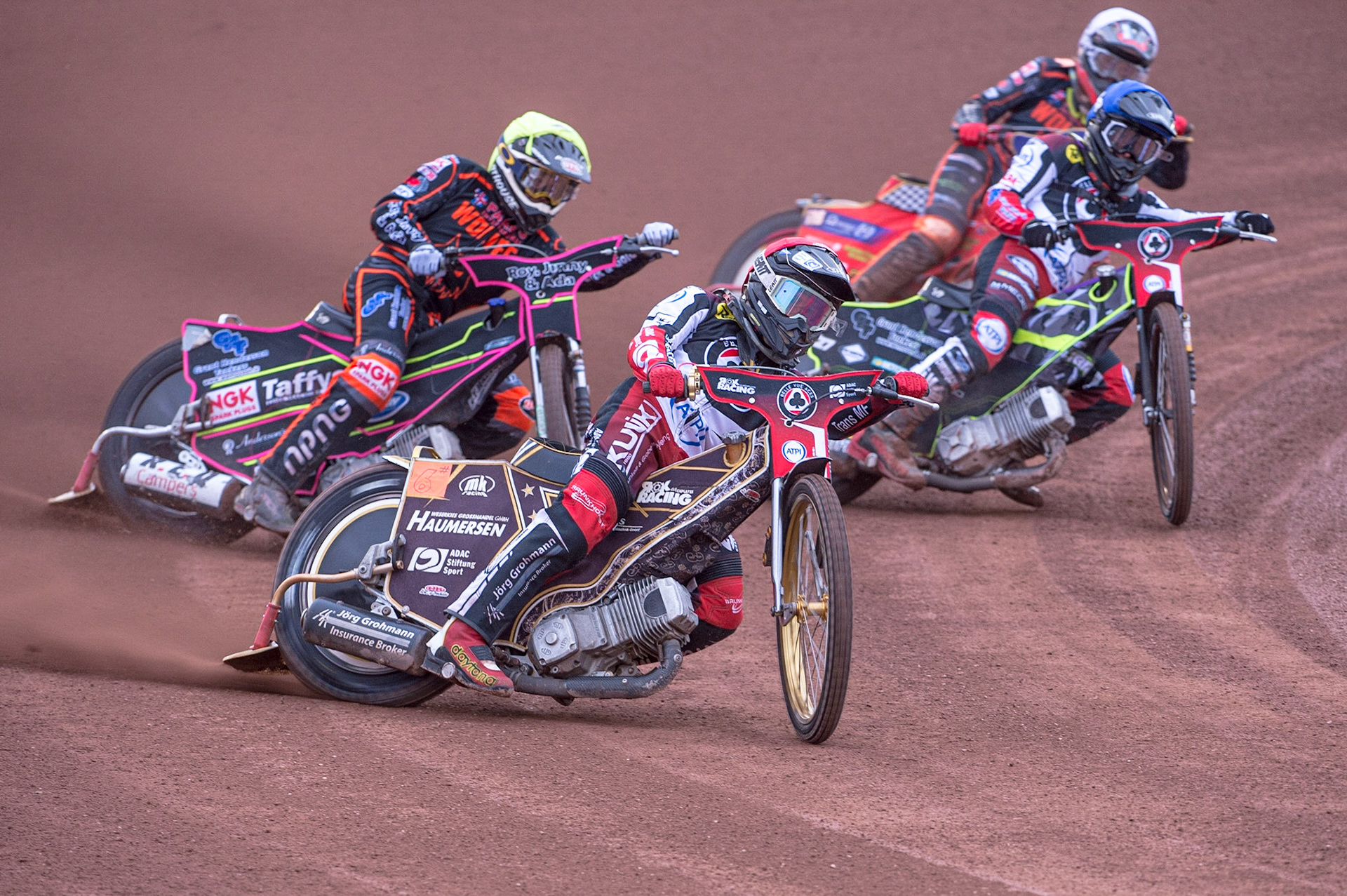 MANCHESTER, UK. JUN 13TH Norick Blödorn (Red) leads Leon Flint  (Yellow) Tom Brennan (Blue) and Drew Kemp  (White) during the SGB Premiership match between Belle Vue Aces and Wolverhampton  Wolves at the National Speedway Stadium, Manchester on Monday 13th June 2022. (Credit: Ian Charles | MI News)