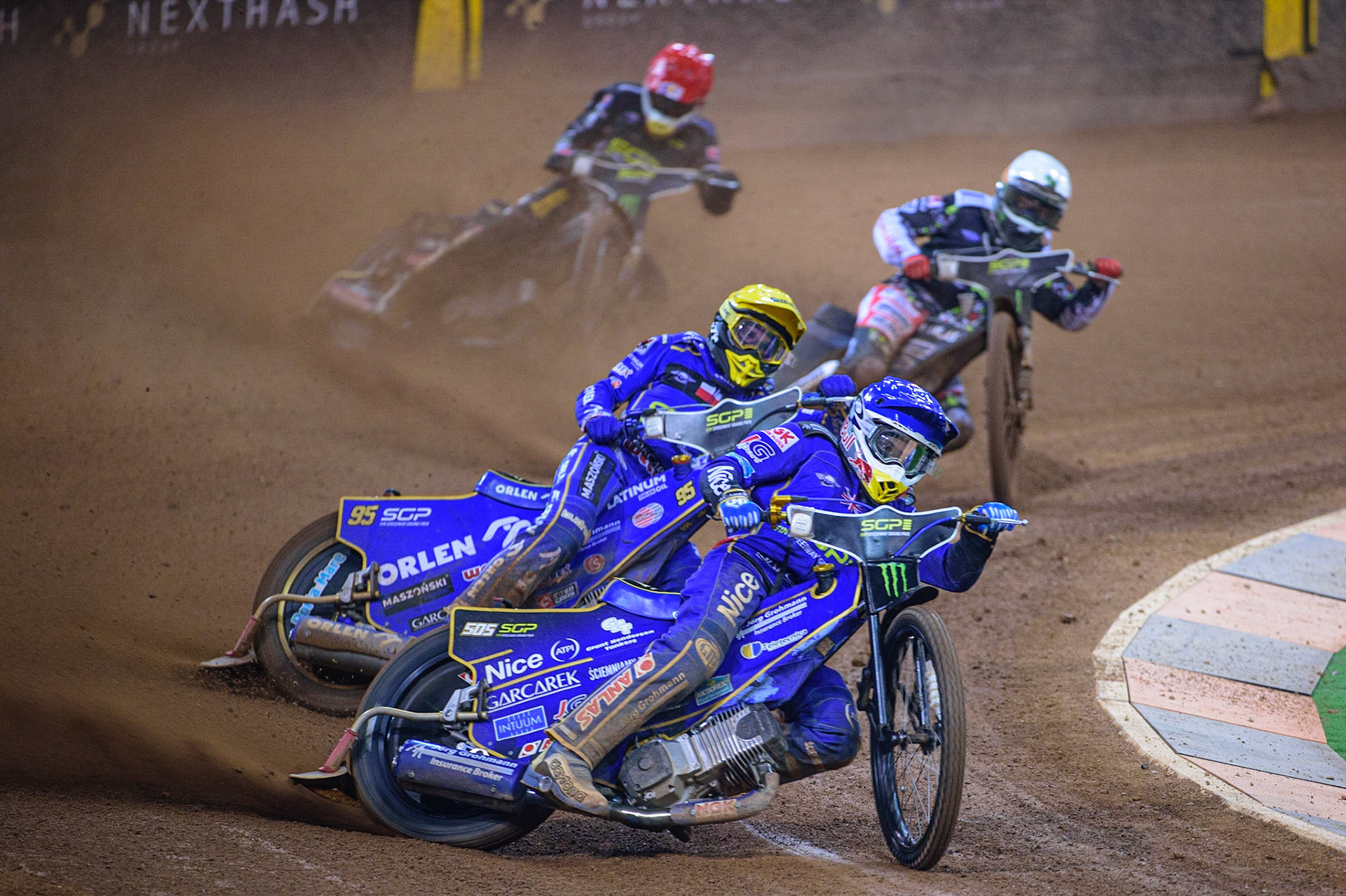 Robert Lambert (505) (Blue) leads Bartosz Zmarzlik (95) (Yellow), Maciej Janowski (71) (Red) and Fredrik Lindgren (66) (White) during the FIM  Speedway Grand Prix of Great Britain at the Principality Stadium, Cardiff on Saturday 13th August 2022. (Credit: Ian Charles | MI News