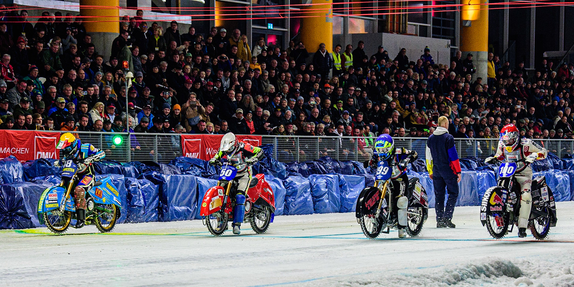 The start of the Final: (l-r) Luca Bauer (48) (Yellow), Harald Simon (50) (White), Martin Haarahiltunen (199) (Blue) and Franz Zorn (100) (Red) during the Ice Speedway Gladiators World Championship Final 1 at Max-Aicher-Arena, Inzell, Germany on Saturday 18th March 2023. (Photo: Ian Charles | MI News)