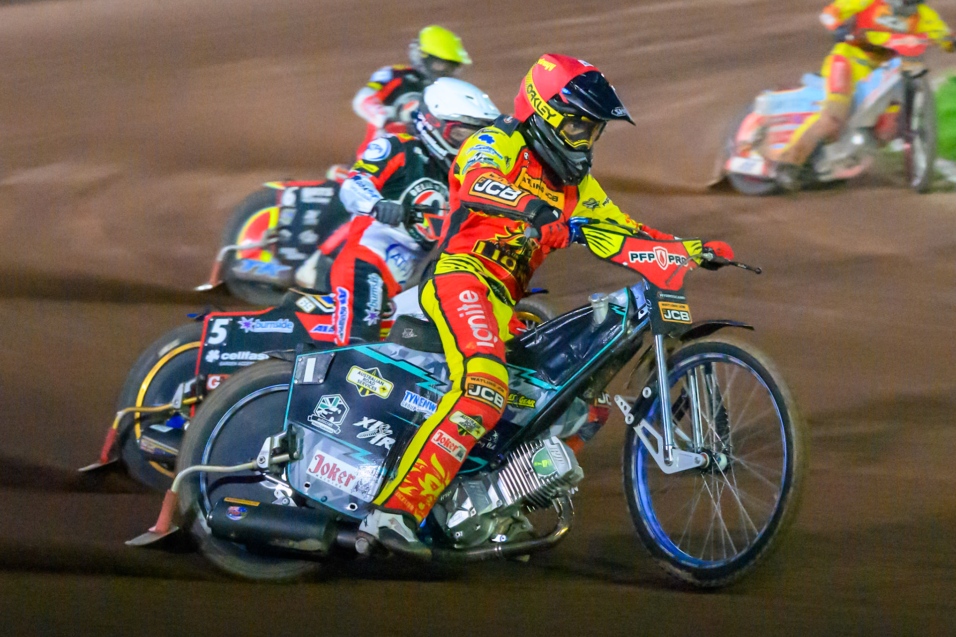 Ryan Douglas of Leicester Lions in Red rides outside Jason Doyle of Belle Vue Aces  in White  and Tate Zischke of Belle Vue Aces  in Yellow during the Rowe Motor Oil Premiership match between Leicester Lions and Belle Vue Aces at the Hydroscan Arena, Leicester on Monday 7th September 2026. (Photo: Ian Charles | MI News)