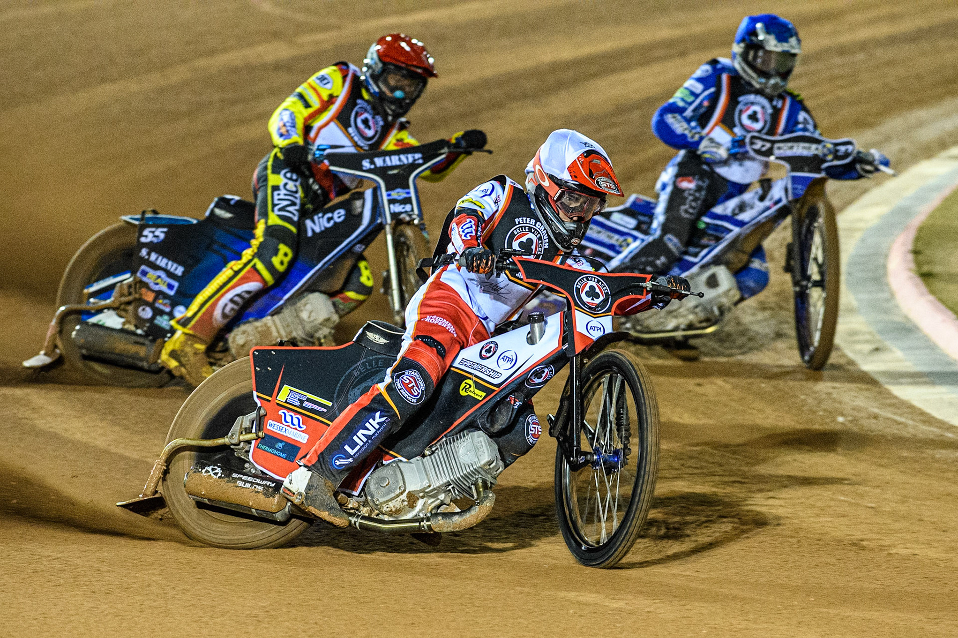 Zach Cook in White leading Matej Zagar in Red and Chris Harris in Blue during the Peter Craven Memorial Trophy at the National Speedway Stadium, Manchester on Monday 17th March 2025. (Photo: Ian Charles | MI News)