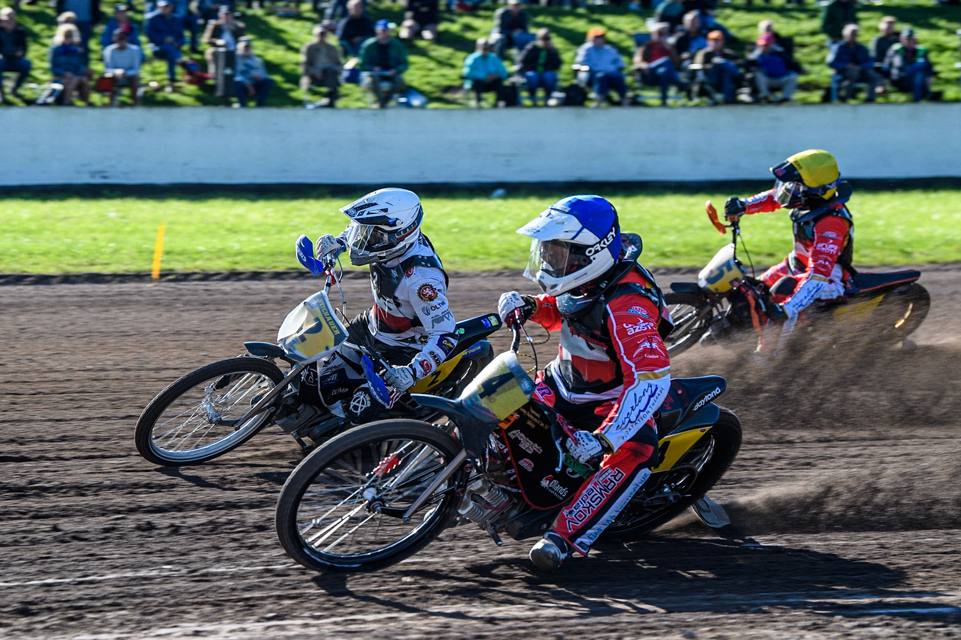 Kenneth K. Hansen (Blue) inside Hynek Stichauer (White) and Jacob Bukhave (Yellow) during the FIM Long Track Of Nations event at the Speed Centre Roden on Sunday 24th September 2023. (Photo: Ian Charles | MI News)