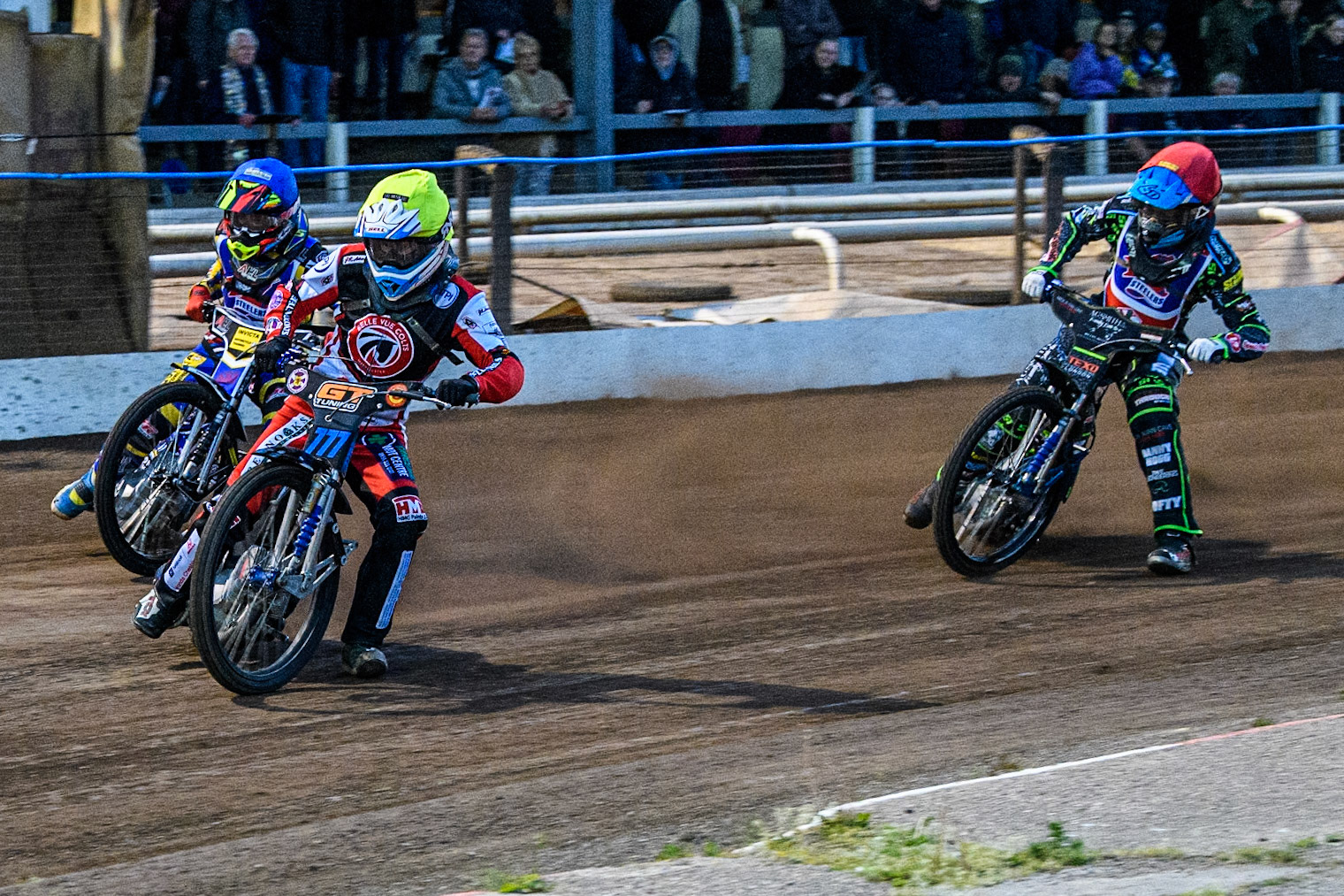 Belle Vue Colts' Billy Budd in Yellow leading Steelers' Harrison Rogers in Red and Steelers' Jamie Etherington in Blue during the WSRA National Development League match between Steelers and Belle Vue Colts at Owlerton Stadium, Sheffield on Monday 5th May 2025. (Photo: Ian Charles | MI News)