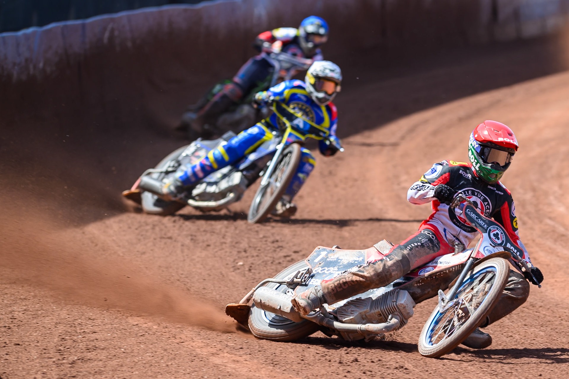 Brady Kurtz of Belle Vue Aces  in Red leading Josh Pickering of Sheffield Tigers in White and Kye Thomson, Guest Rider for Belle Vue Aces in Blue during the Rowe Motor Oil Premiership match between Belle Vue Aces and Sheffield Tigers at the National Speedway Stadium, Manchester on Monday 25th May 2026. (Photo: Ian Charles | MI News)